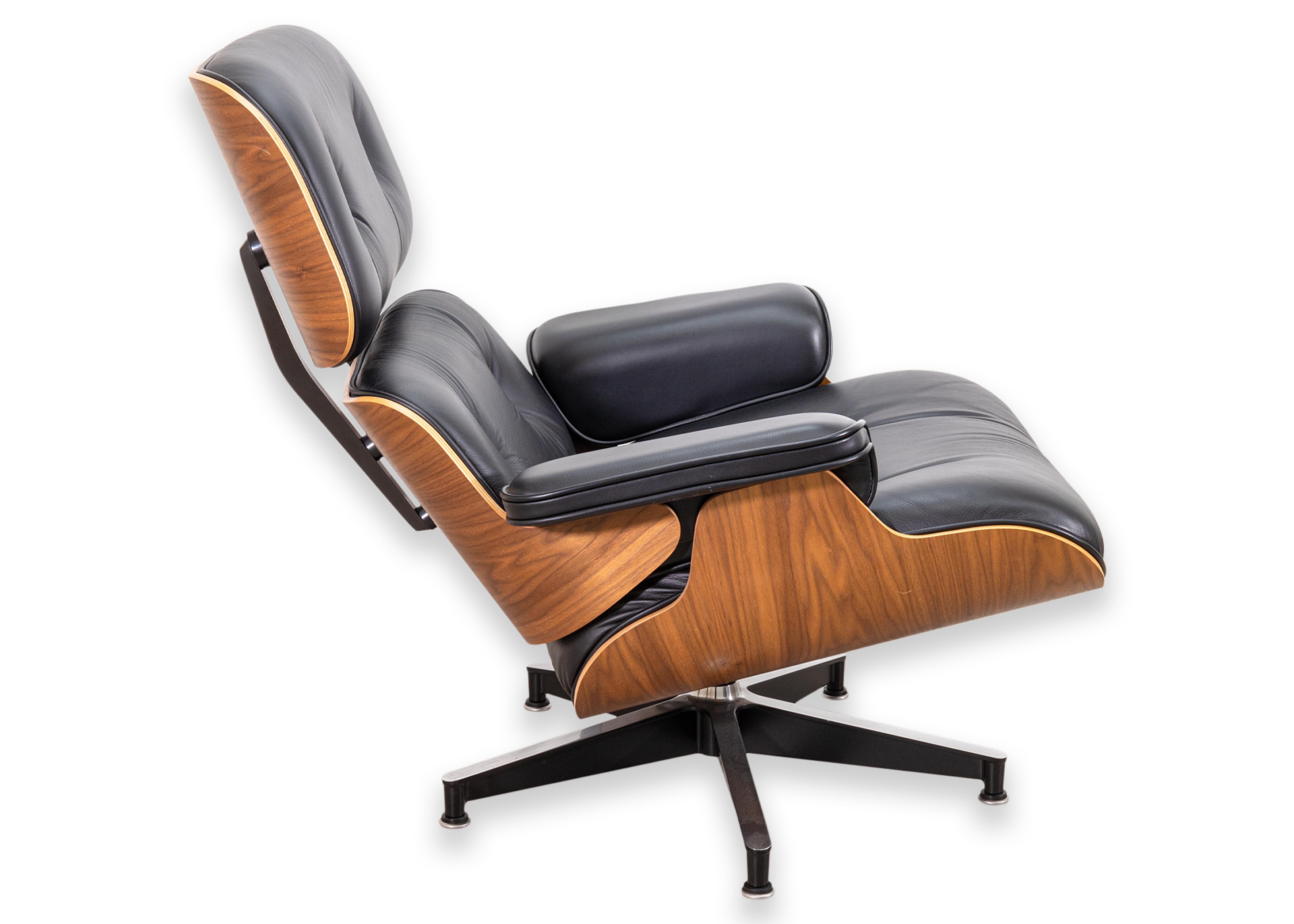 Eames for Herman Miller Walnut and Black Leather Lounge Chair and Ottoman w Tags In Good Condition In Keego Harbor, MI