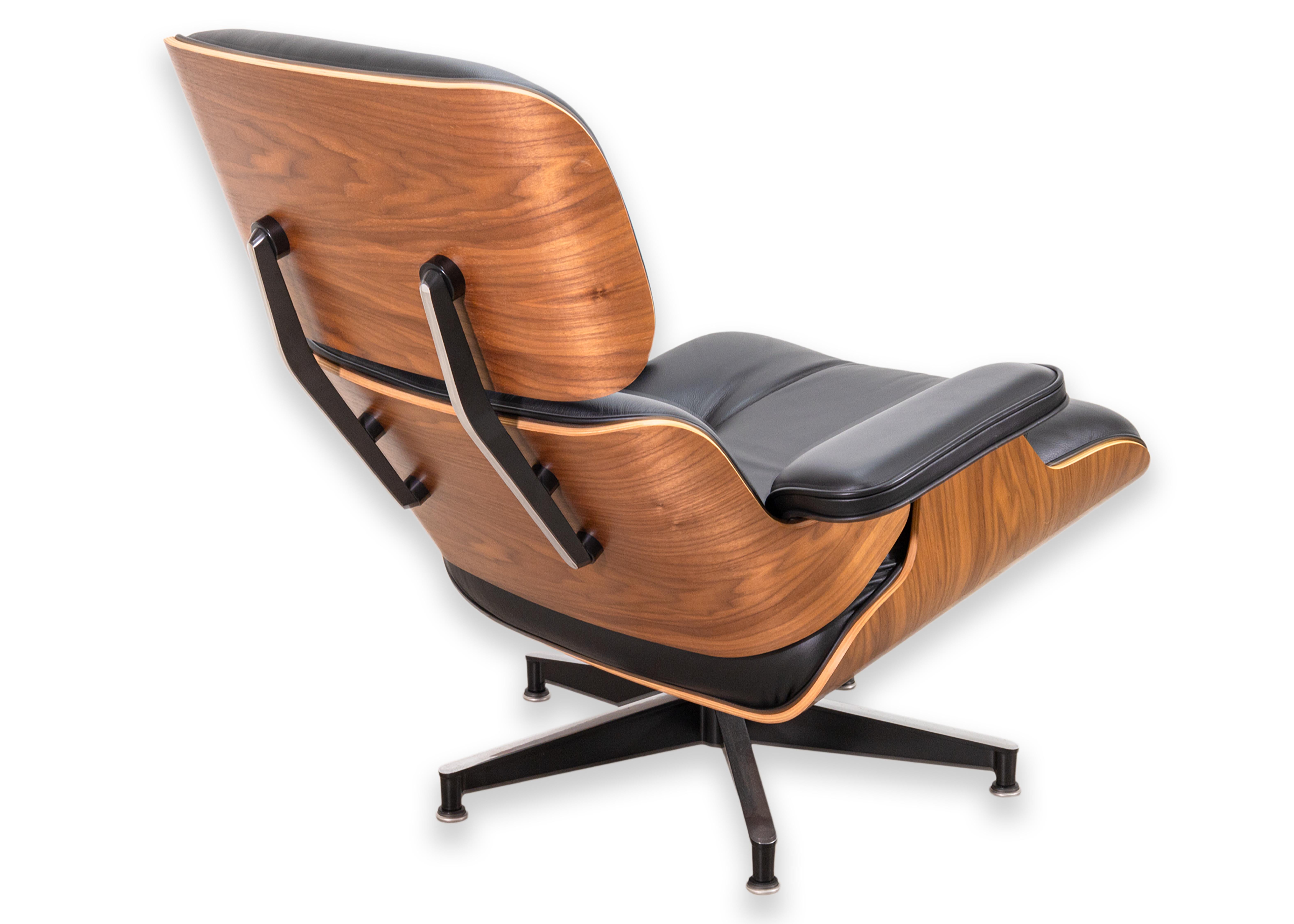 20th Century Eames for Herman Miller Walnut and Black Leather Lounge Chair and Ottoman w Tags