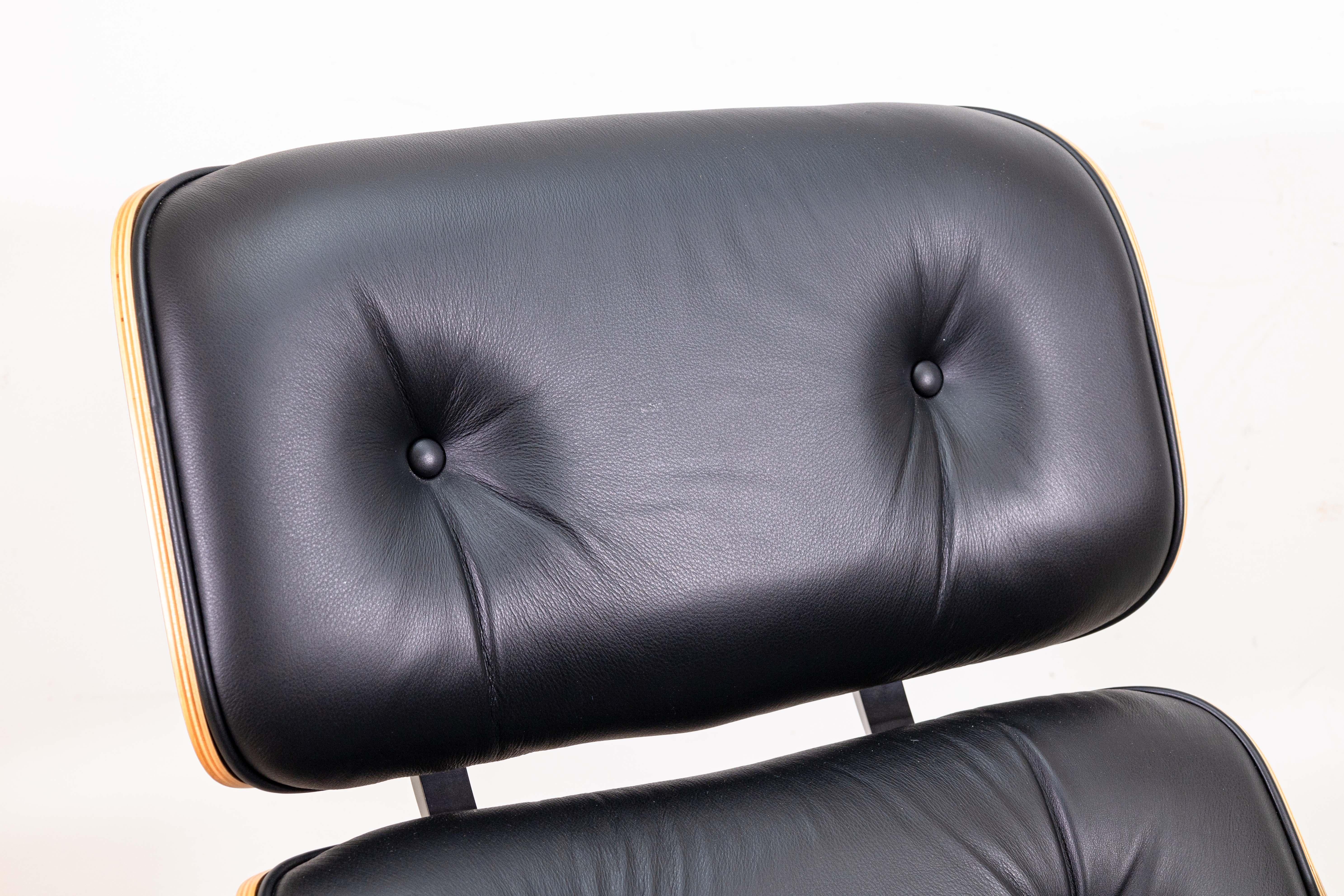 Eames for Herman Miller Walnut and Black Leather Lounge Chair and Ottoman w Tags 1