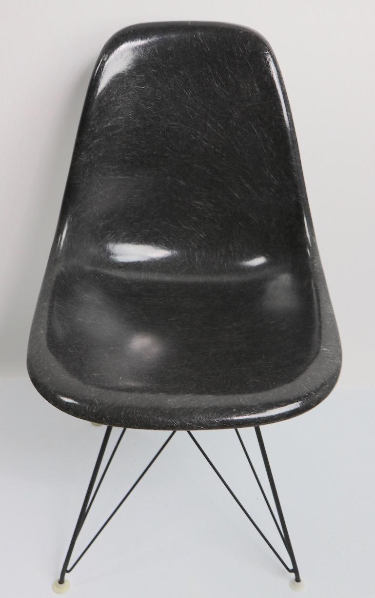 Very nice original version of the iconic Charles and Ray Eames fiberglass shell chair on Eiffel Tower, or Cage, base. The grey shell is original to the base, not a later marriage, or reproduction base, circa 1960s production, Eames for Herman