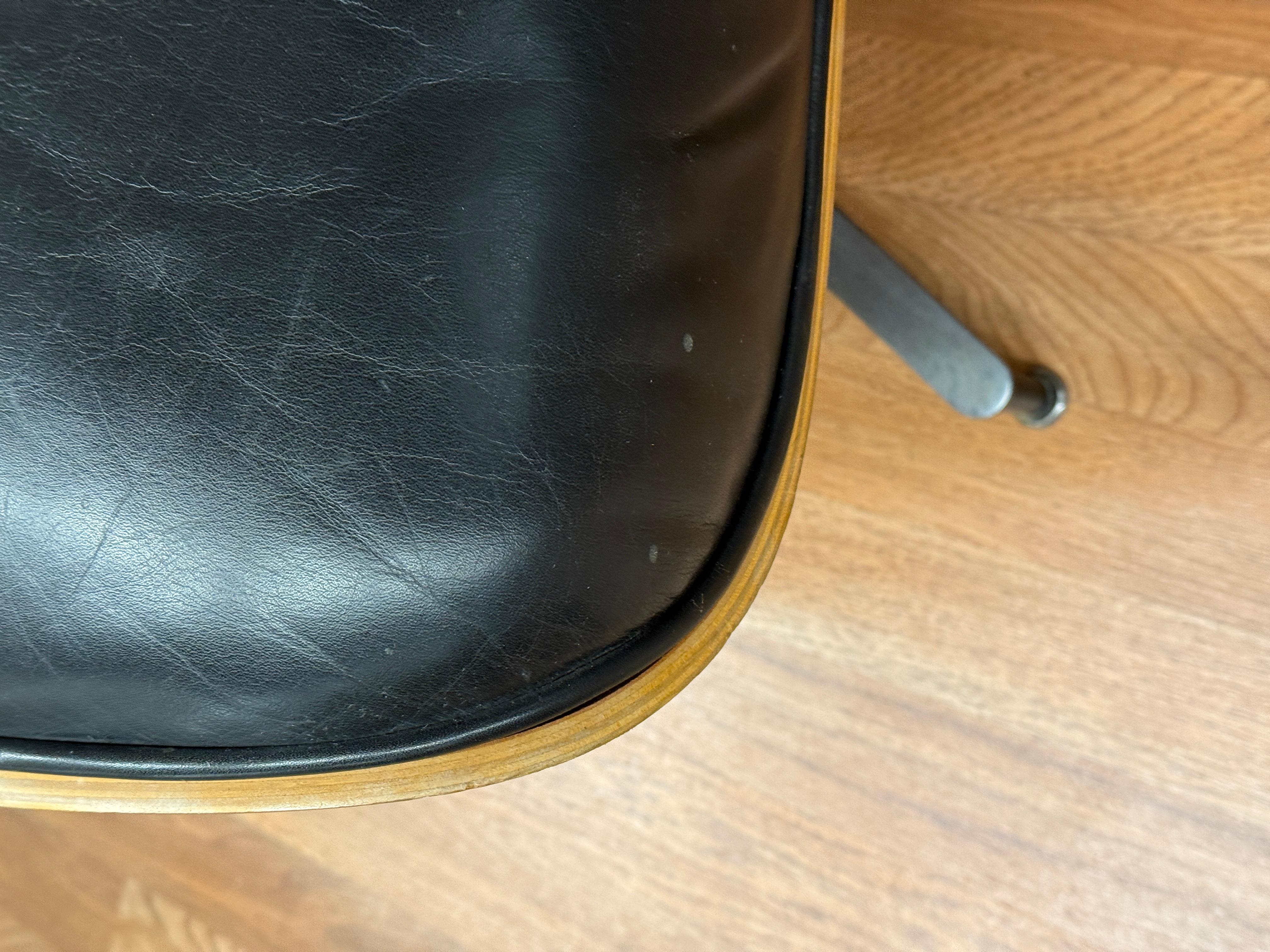 Eames Herman Miller 671 Ottoman in Black Leather and Cherry 1