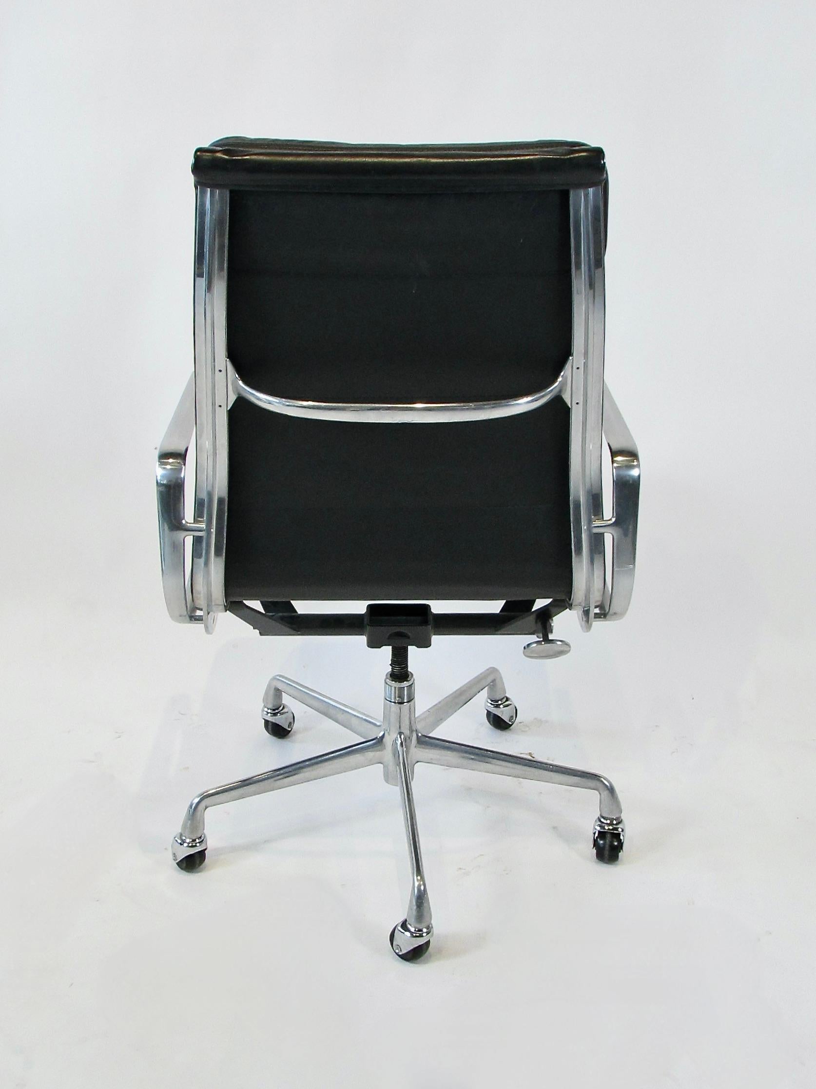 Polished Eames Herman Miller Aluminum Group black leather swivel tilt soft pad chair For Sale