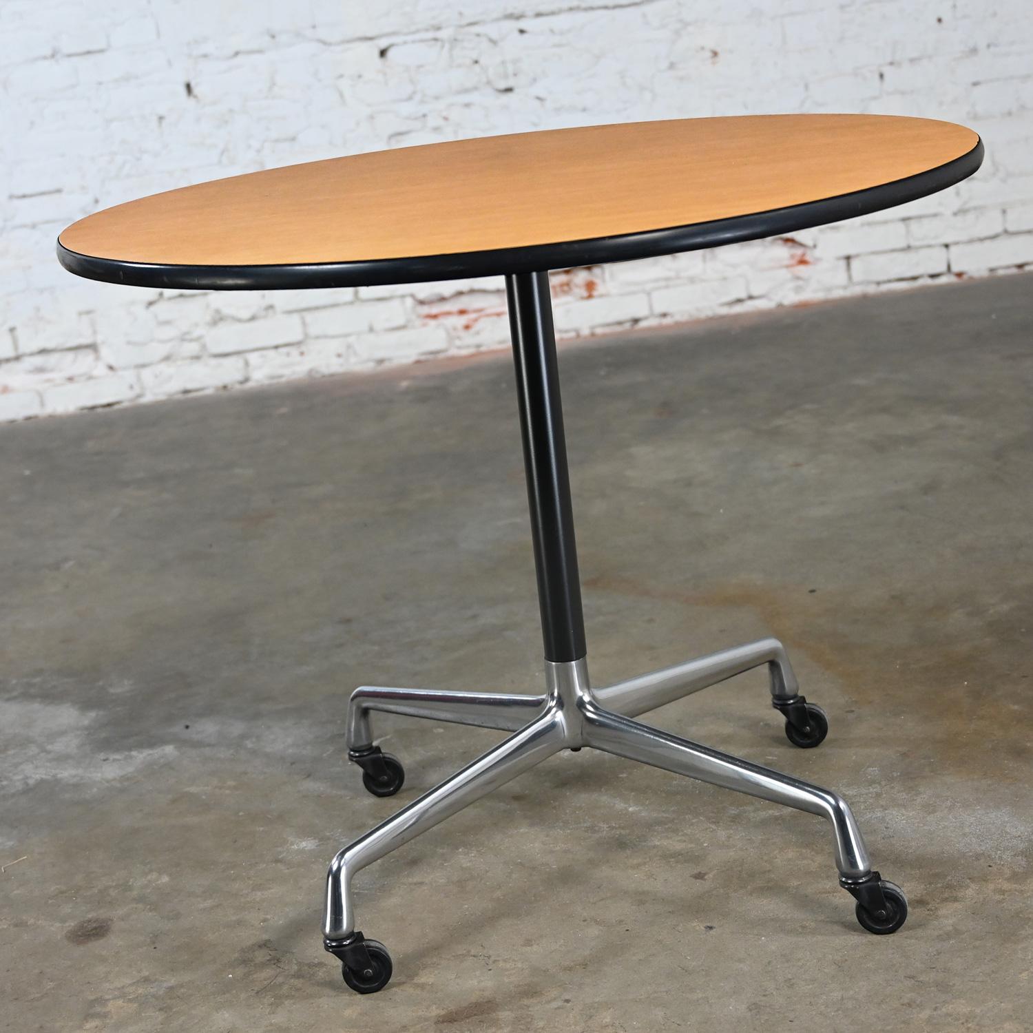 Eames Herman Miller Round Table Universal Base Casters & 36” Blonde Laminate Top For Sale 4