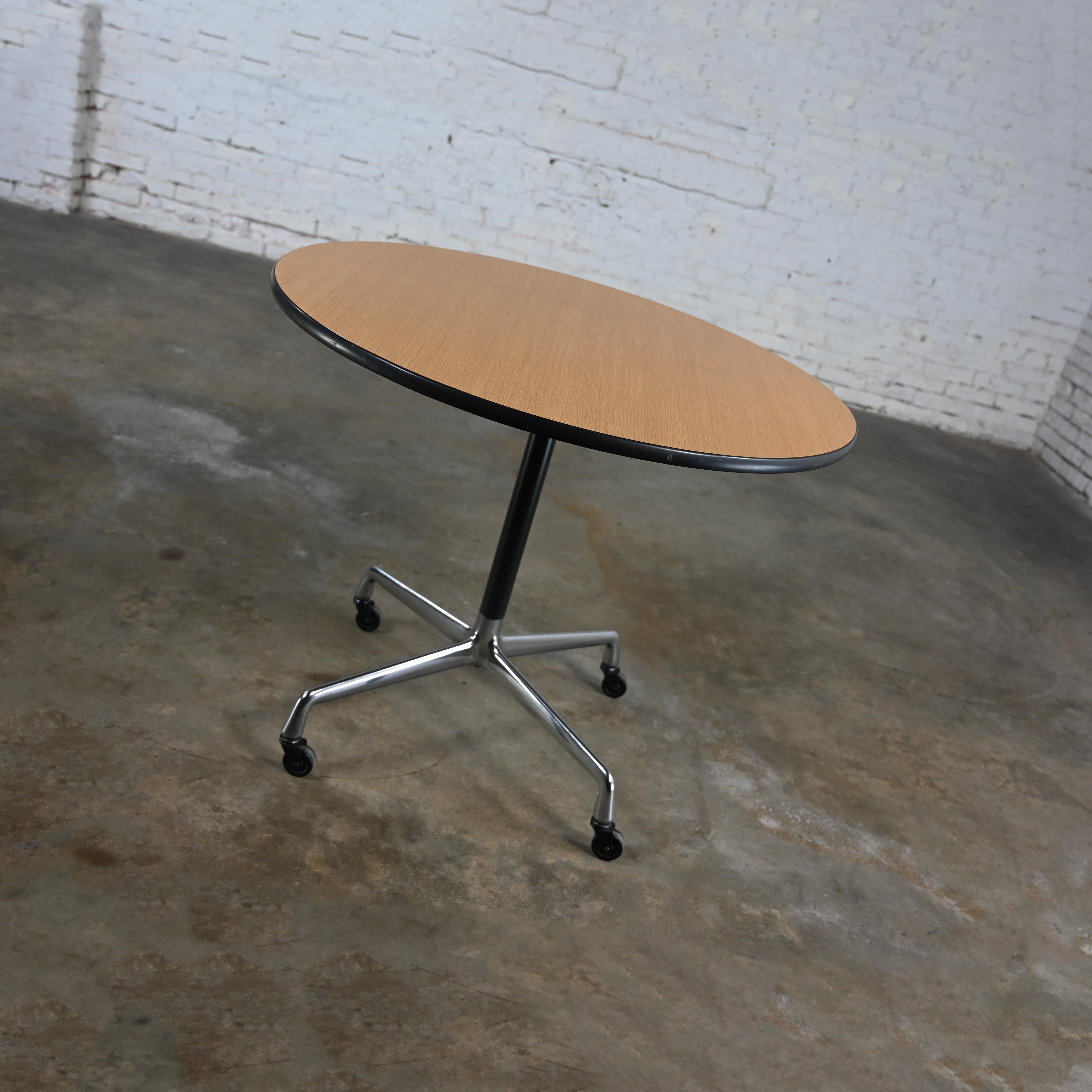 Eames Herman Miller Round Table Universal Base Casters & 36” Blonde Laminate Top For Sale 10
