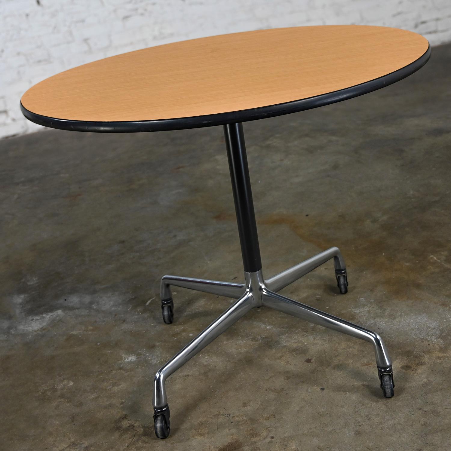 Eames Herman Miller Round Table Universal Base Casters & 36” Blonde Laminate Top For Sale 13