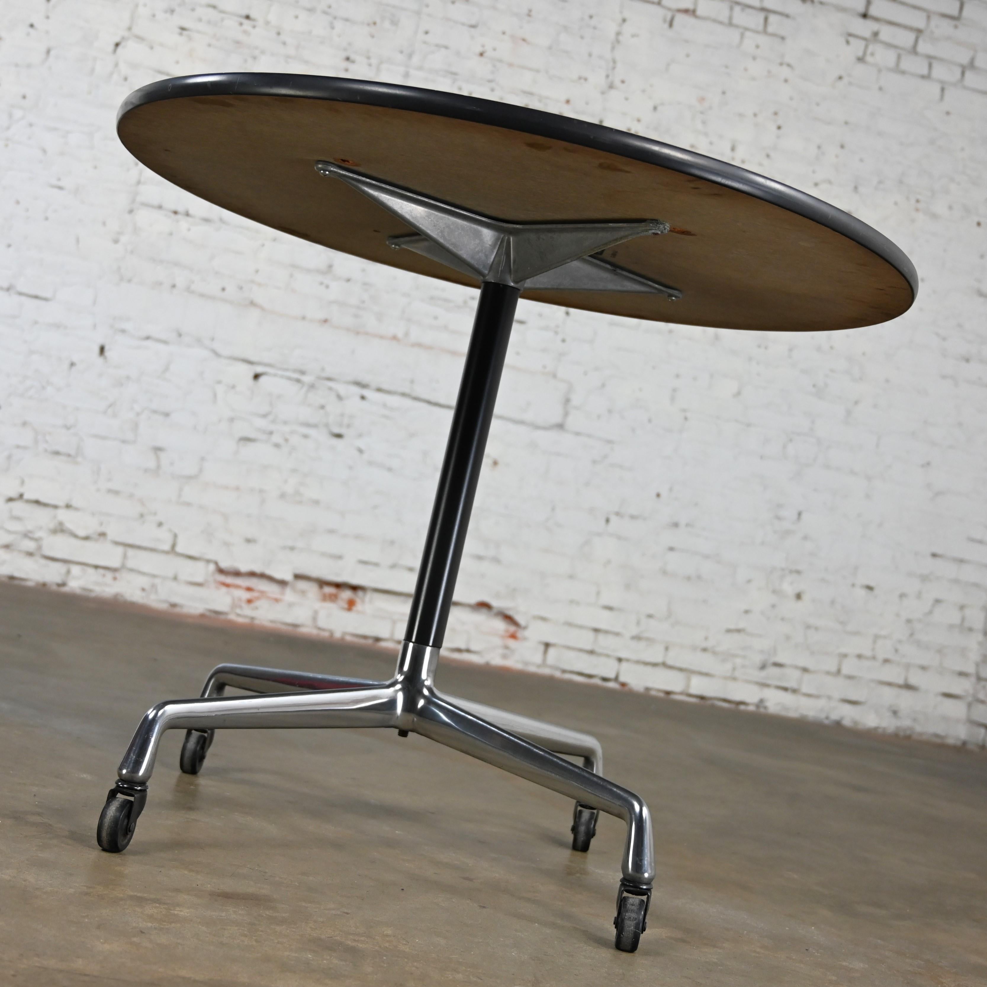 20th Century Eames Herman Miller Round Table Universal Base Casters & 36” Blonde Laminate Top For Sale