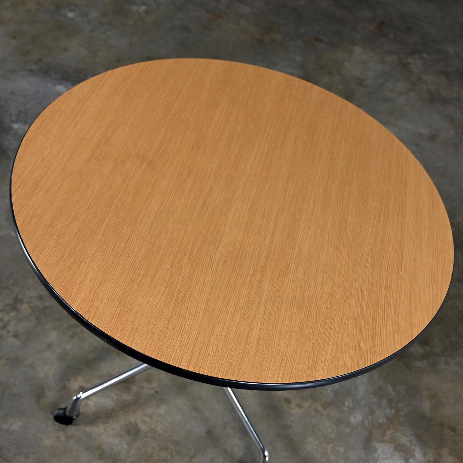 Eames Herman Miller Round Table Universal Base Casters & 36” Blonde Laminate Top For Sale 1
