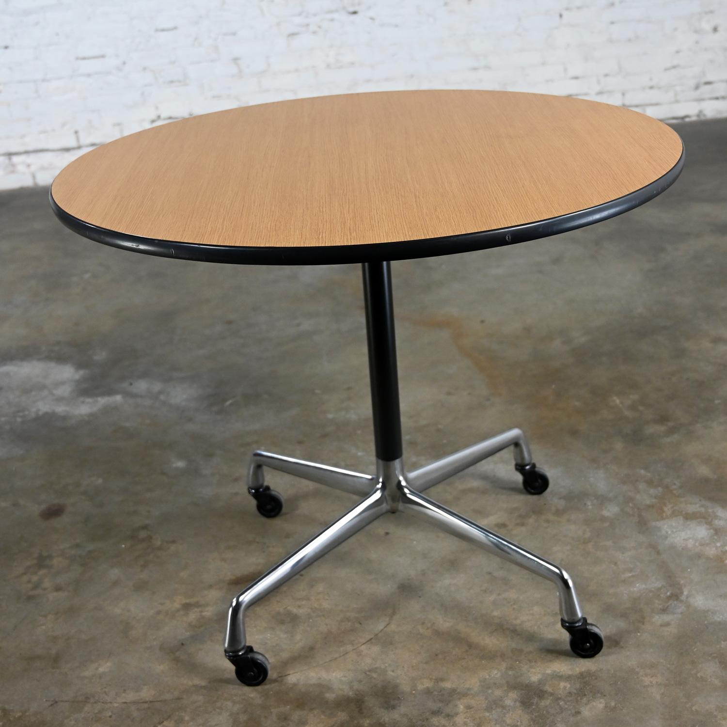 Eames Herman Miller Round Table Universal Base Casters & 36” Blonde Laminate Top For Sale 2