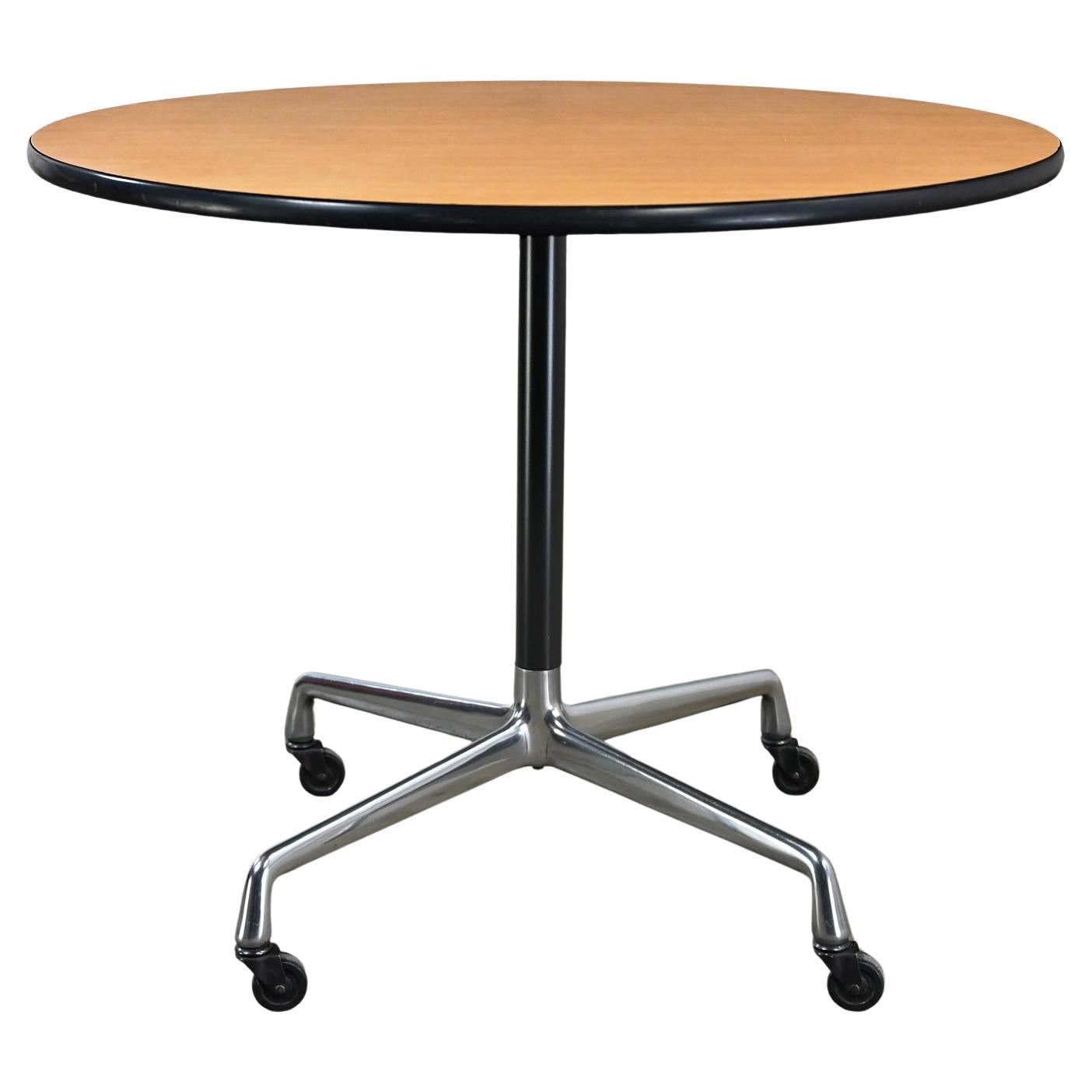 Eames Herman Miller Round Table Universal Base Casters & 36” Blonde Laminate Top For Sale