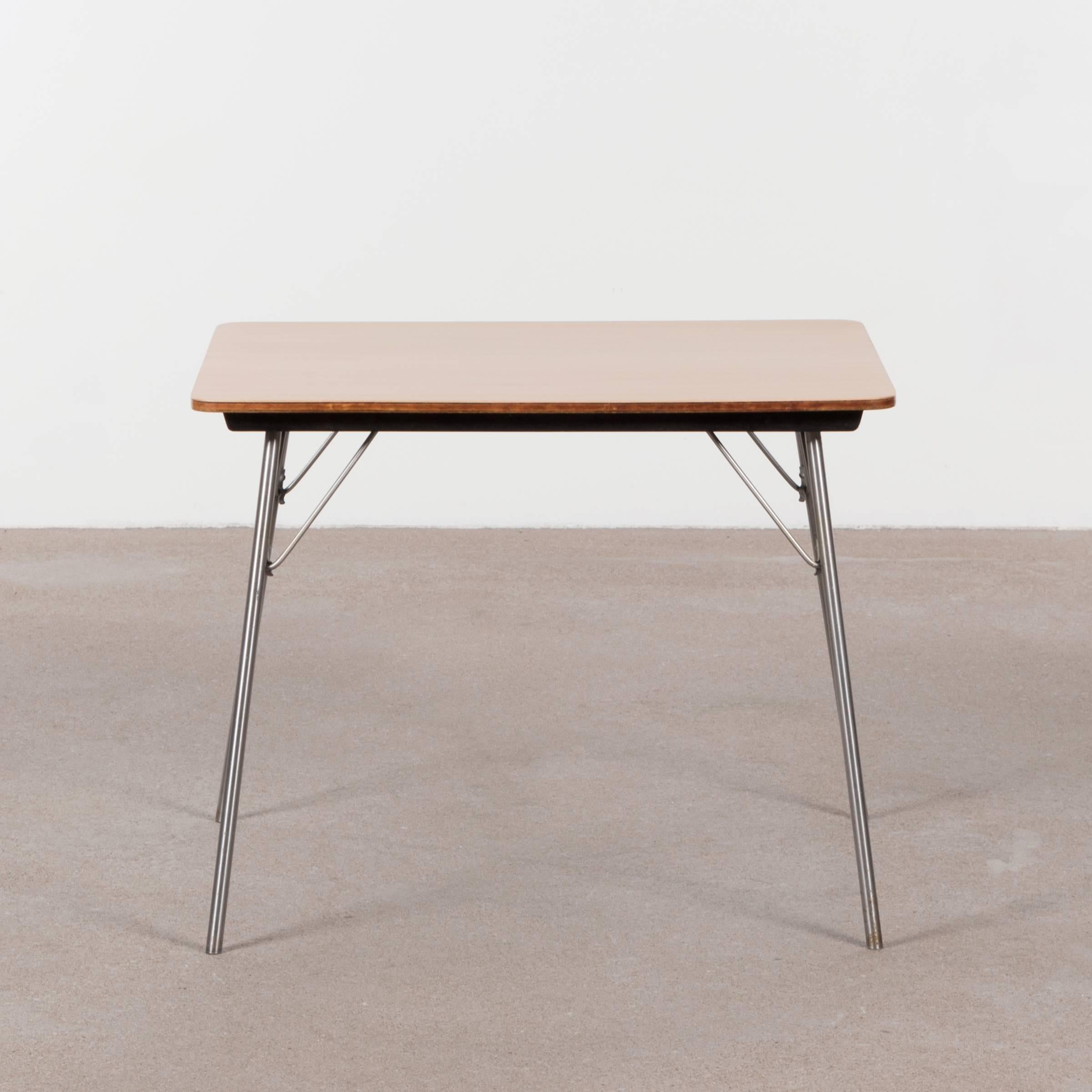 Early and rare Eames IT-1 Incidental Table in production till 1956. Metal folding legs with plywood tabletop finished with Maple wood veneer (restored). Excellent condition and hard to find table.