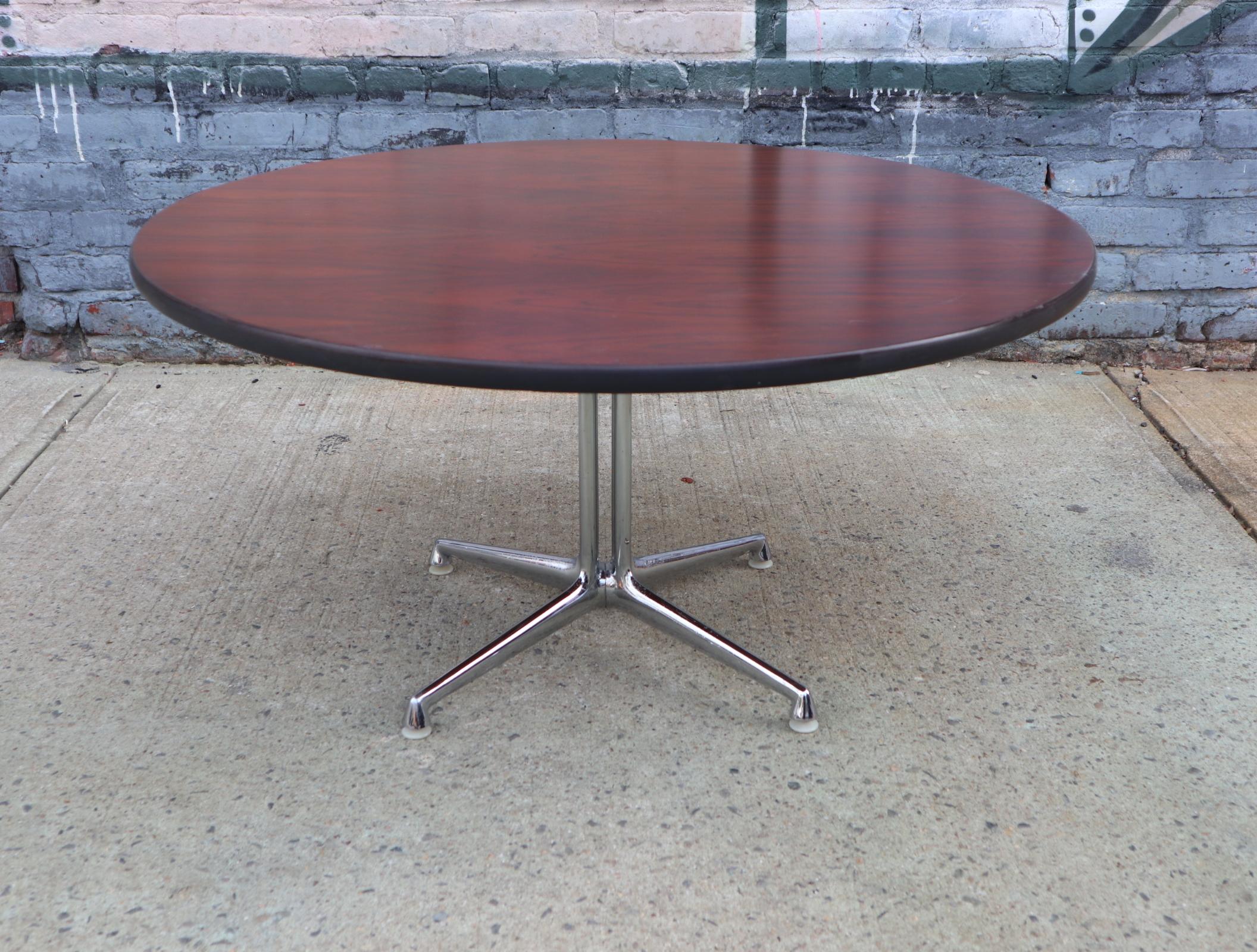 Super and very rare Eames La Fonda coffee table in rosewood. The Eameses created this base specifically for the Alexander Girard designed La Fonda del Sol restaurant in the Time Life building in Manhattan in 1960. This coffee table usually comes