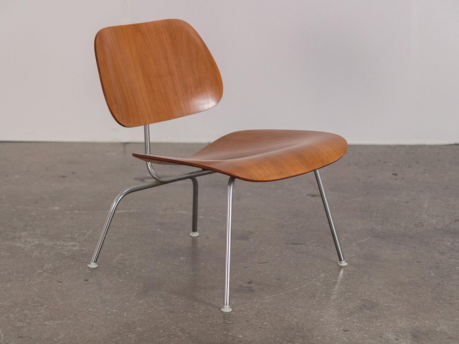 1960s walnut molded plywood LCM chair by Charles and Ray Eames for Herman Miller. Walnut wood has a lovely patina throughout, and areas of wear strike the perfect balance revealing the attractive grain underneath. Original polished chrome legs with