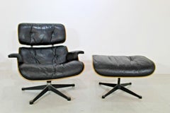 Eames fauteuil de salon des années 1960 en cuir noir et bois de rose