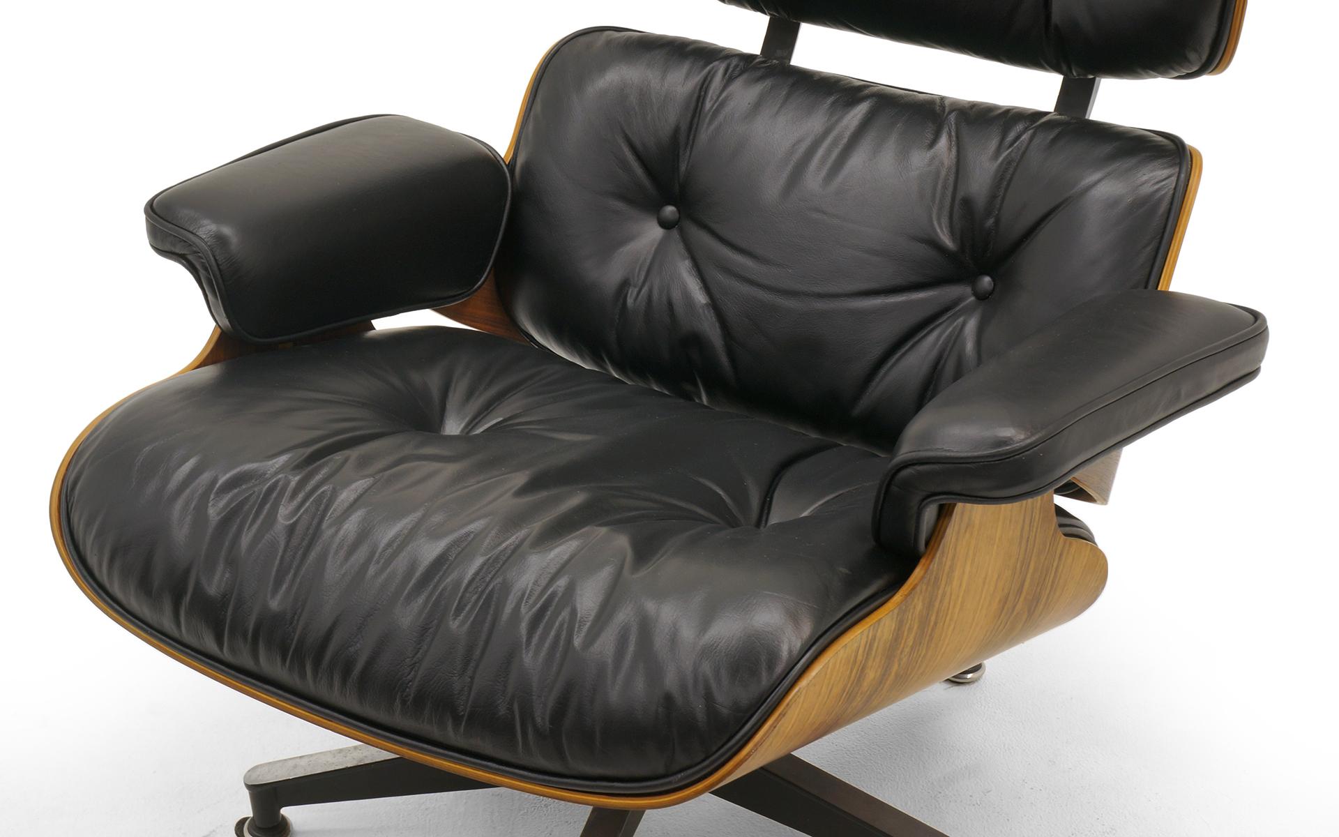 Mid-Century Modern Eames Lounge Chair 670 and Ottoman 671, Rosewood and Restored Black Leather
