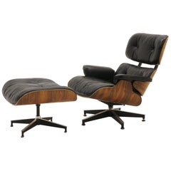 Eames Lounge Chair 670 and Ottoman 671, Rosewood and Restored Black Leather