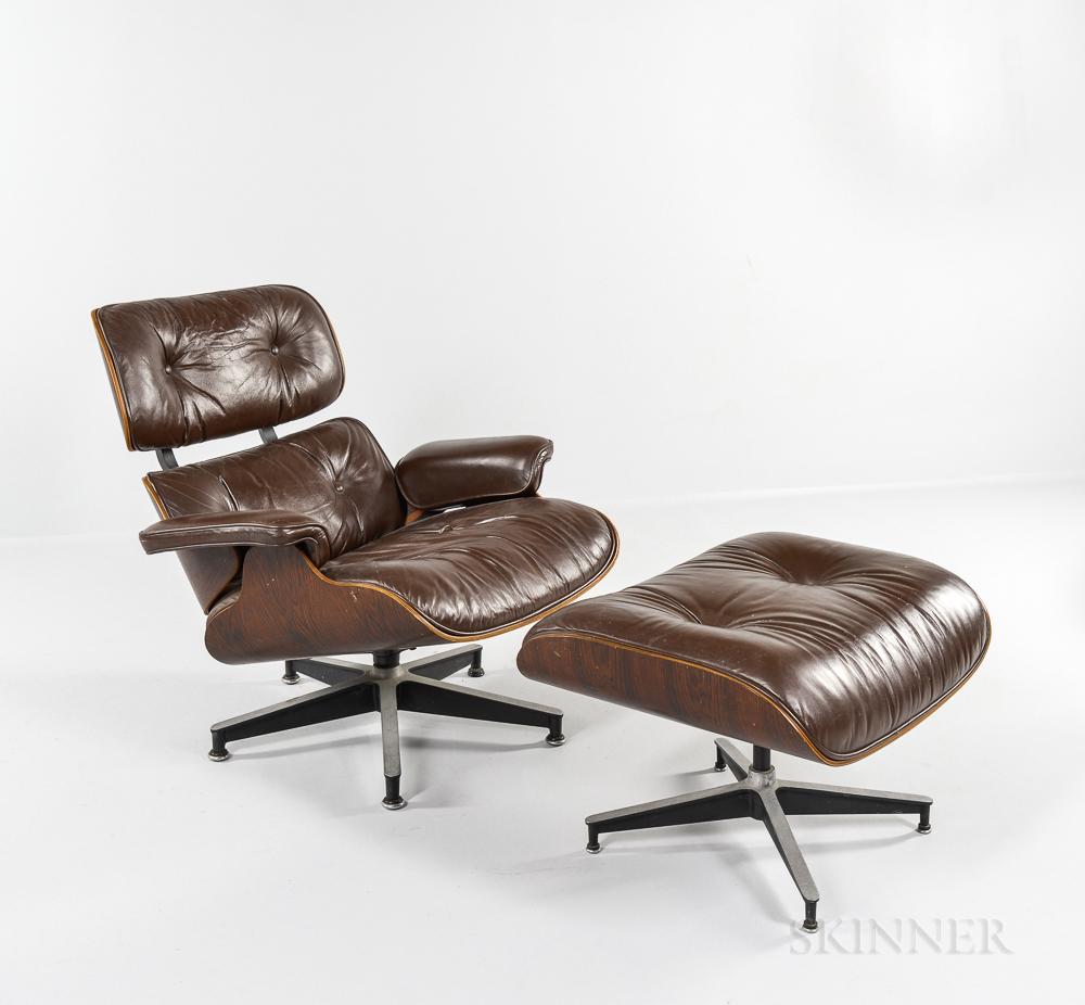 Gorgeous 1970s Herman Miller Eames lounge chair and ottoman. Original brown leather cushions. In very good vintage condition. Ottoman original to chair. Signed.