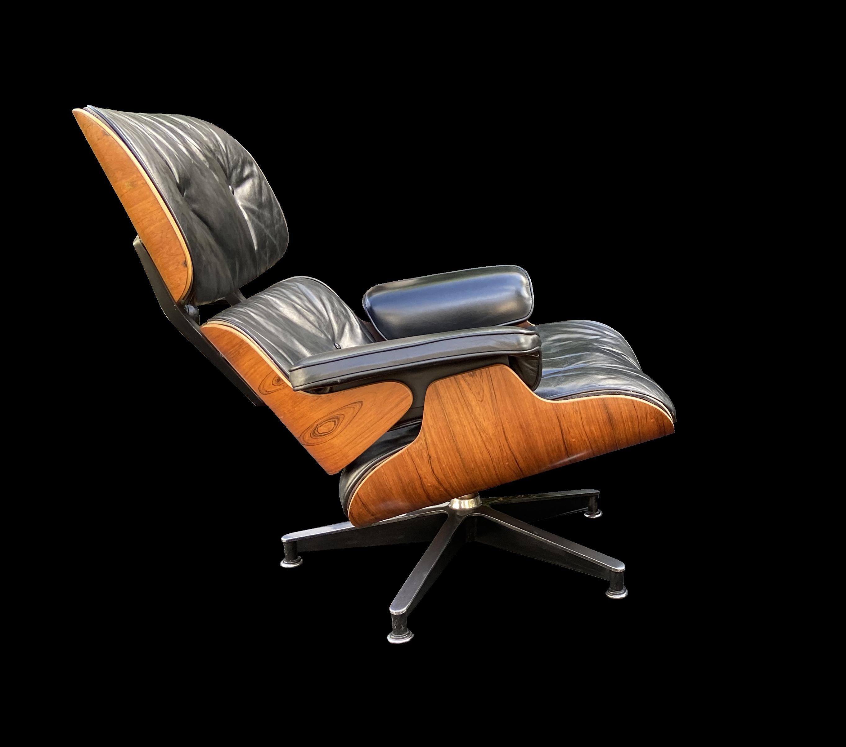 eames black leather lounge chair and ottoman