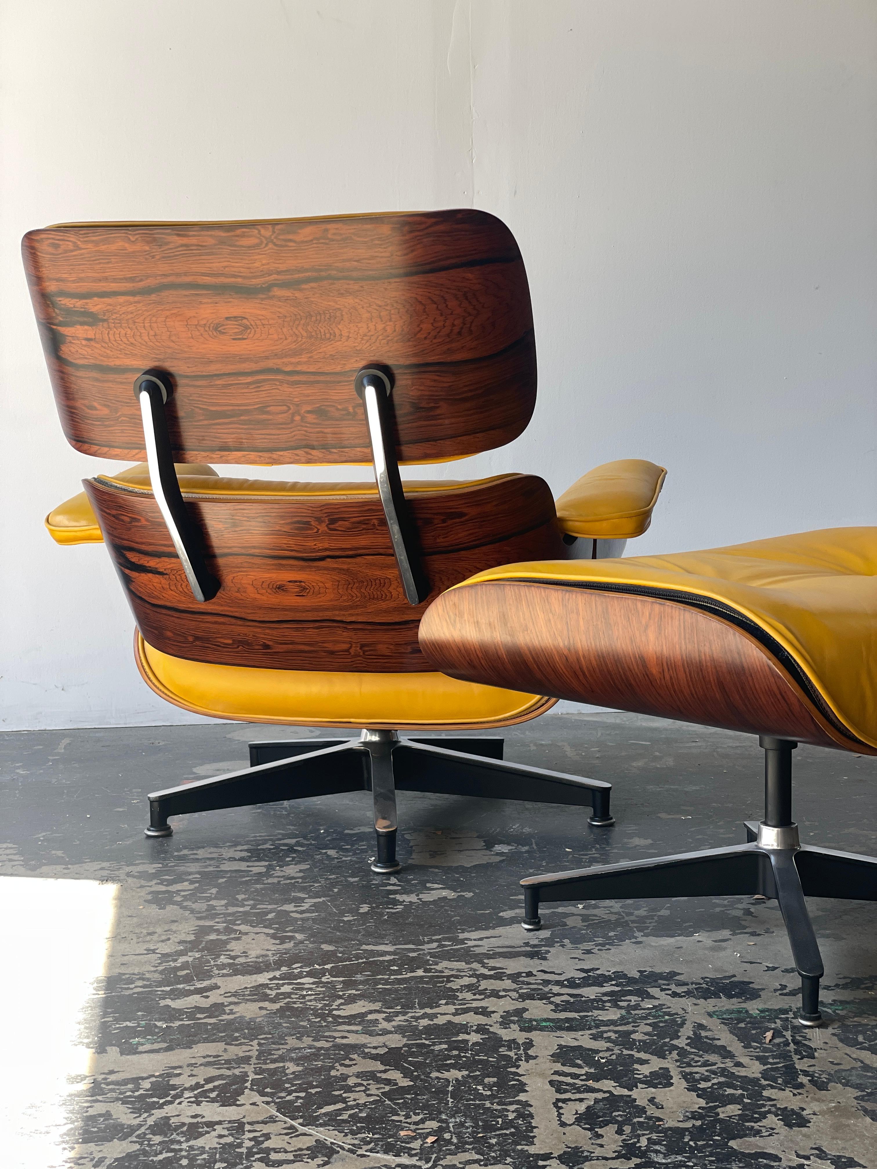 Just restored! This incredible 3rd generation Eames Lounge chair and ottoman have been restored with refinished rosewood shells, new shock mounts, and brand new yellow leather and down filled cushions. We love how the daffodil yellow cushions make
