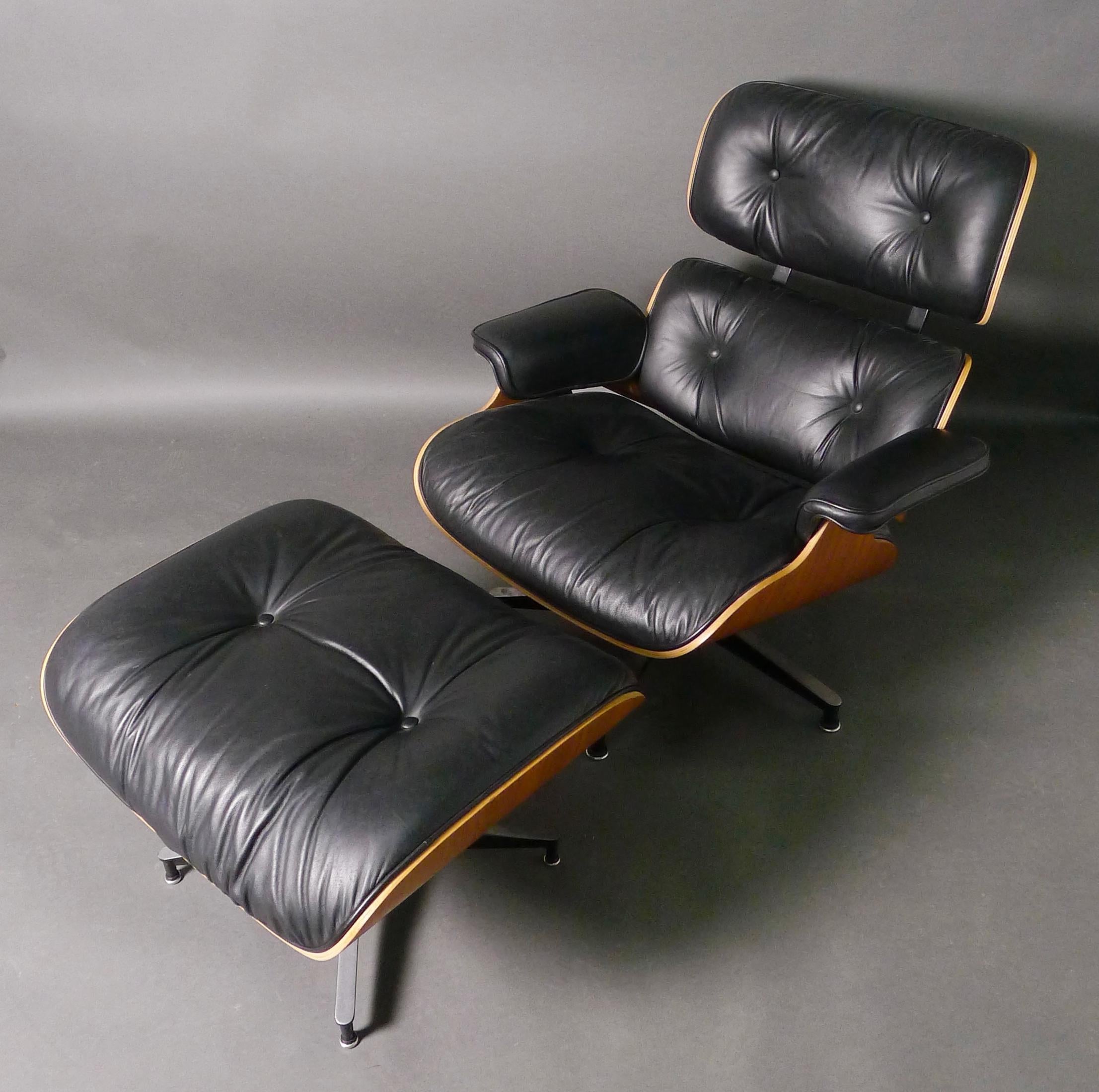 Charles and Ray Eames Lounge Chair and Ottoman, model 670/671 for Herman Miller, USA

Walnut veneer shell with black leather padded and buttoned upholstery. Labels to underside of both pieces.

In good condition, believed to be of 1980s