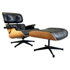 Eames Loungesessel Vitra Sessel mit Ottomane in Schwarz, schwarz