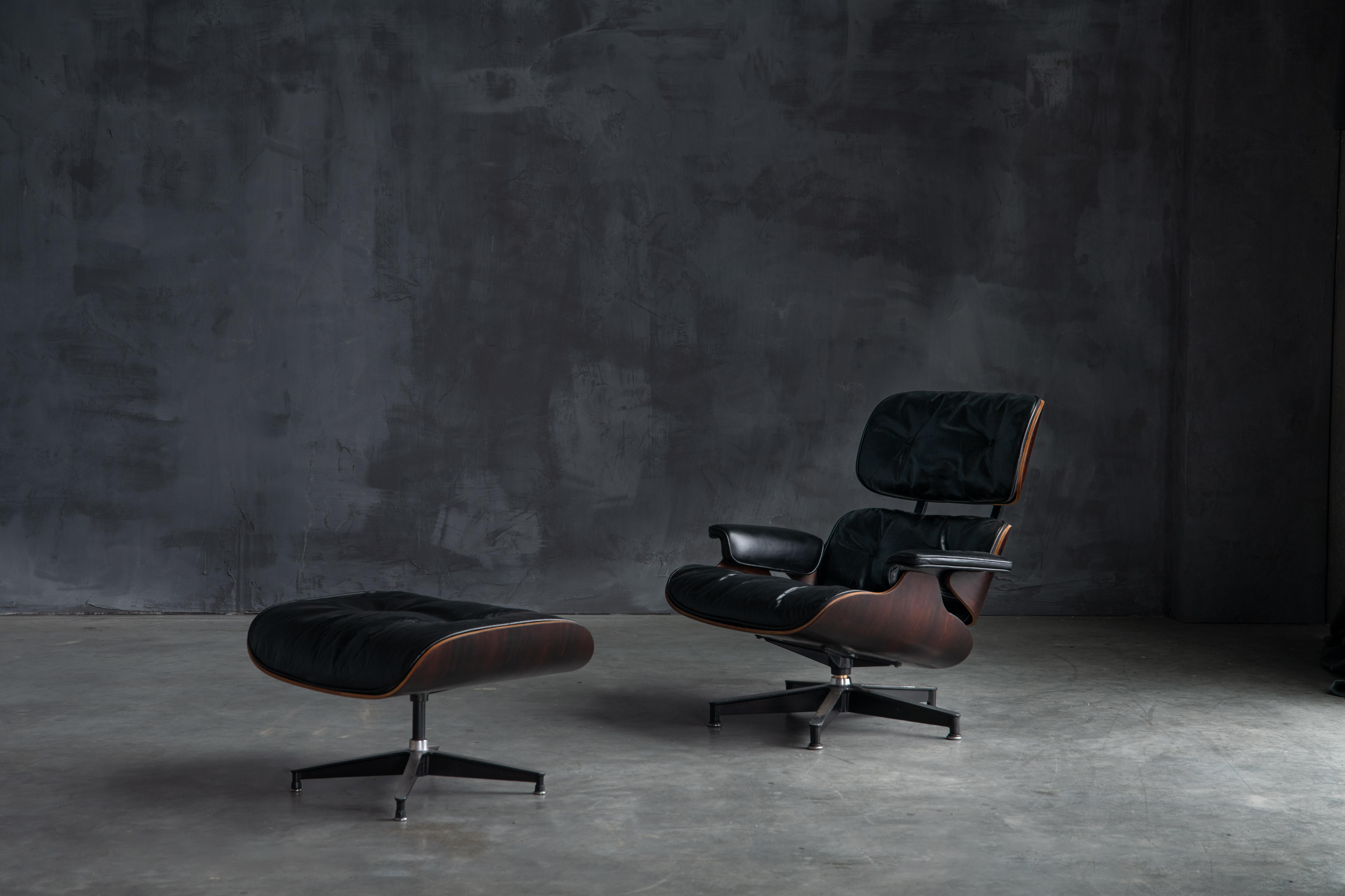 Eames lounge chair with ottoman, designed by the iconic duo Charles and Ray Eames for Herman Miller. This timeless icon has been carefully restored to its first-generation glory, born March 5, 1957, in the United States. It features the signature