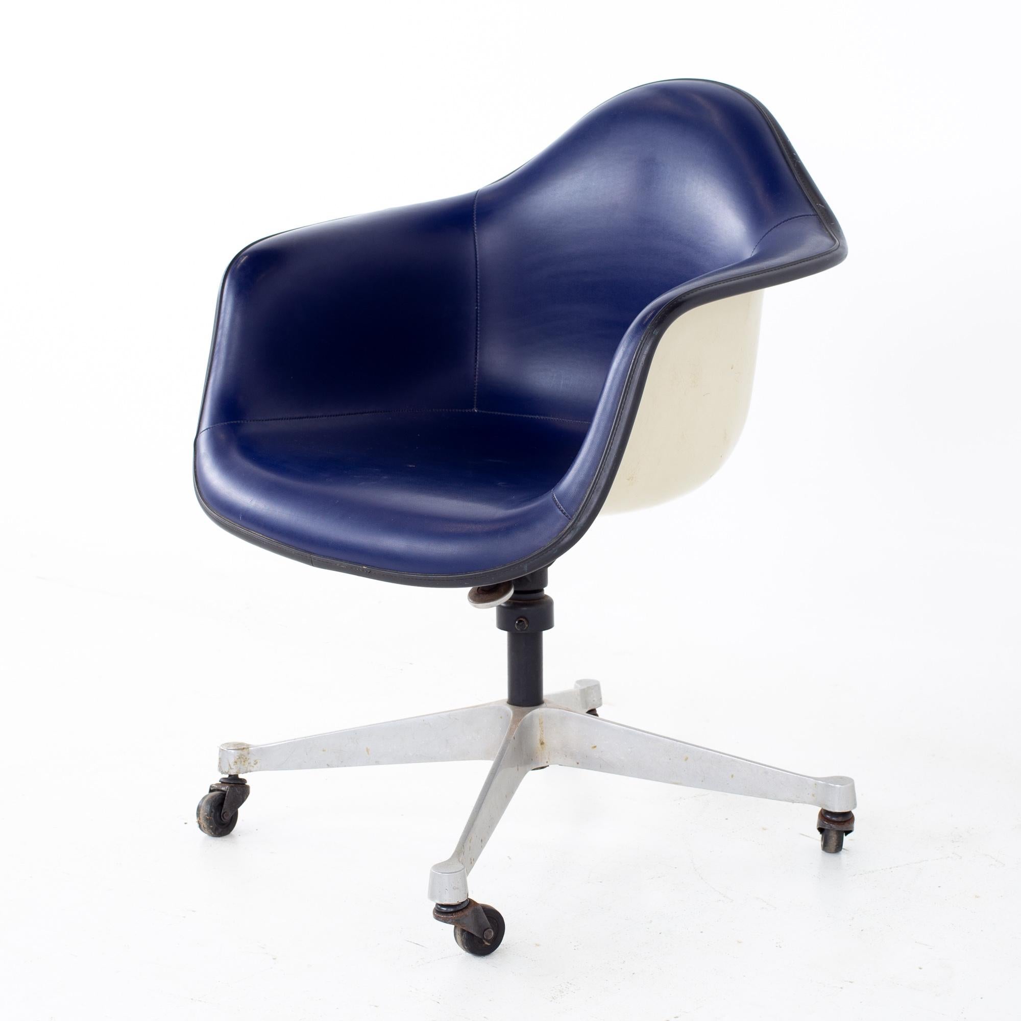 Eames mid century purple fiberglass shell chair
Chair measures: 24.75 wide x 25 deep x 29 high, with a seat height of 18 inches and arm height of 25 inches

All pieces of furniture can be had in what we call restored vintage condition. That means