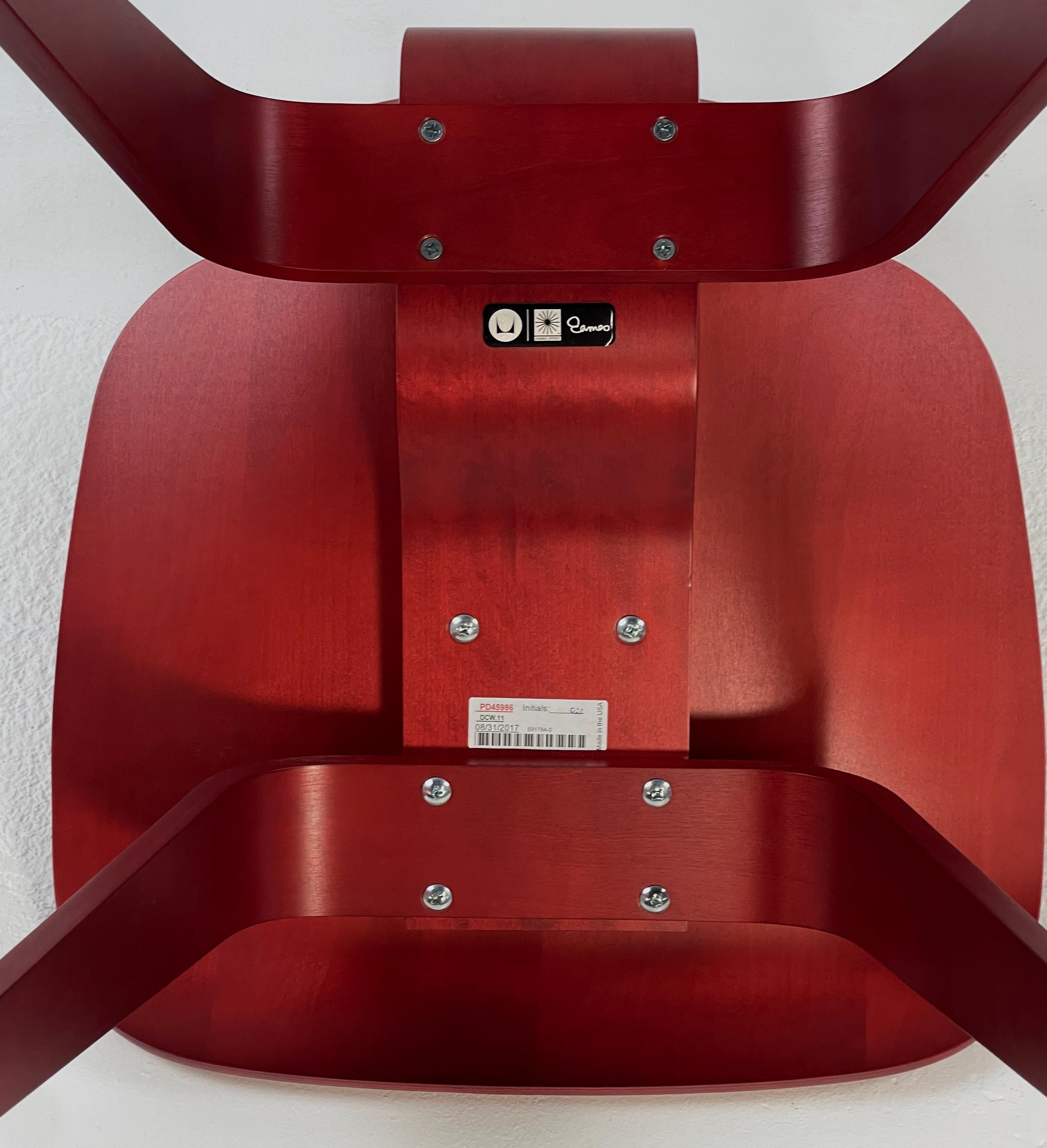 Rubber Eames Molded Plywood Dining Chair Wood Base (DCW) in Red Stained Birch excellent For Sale