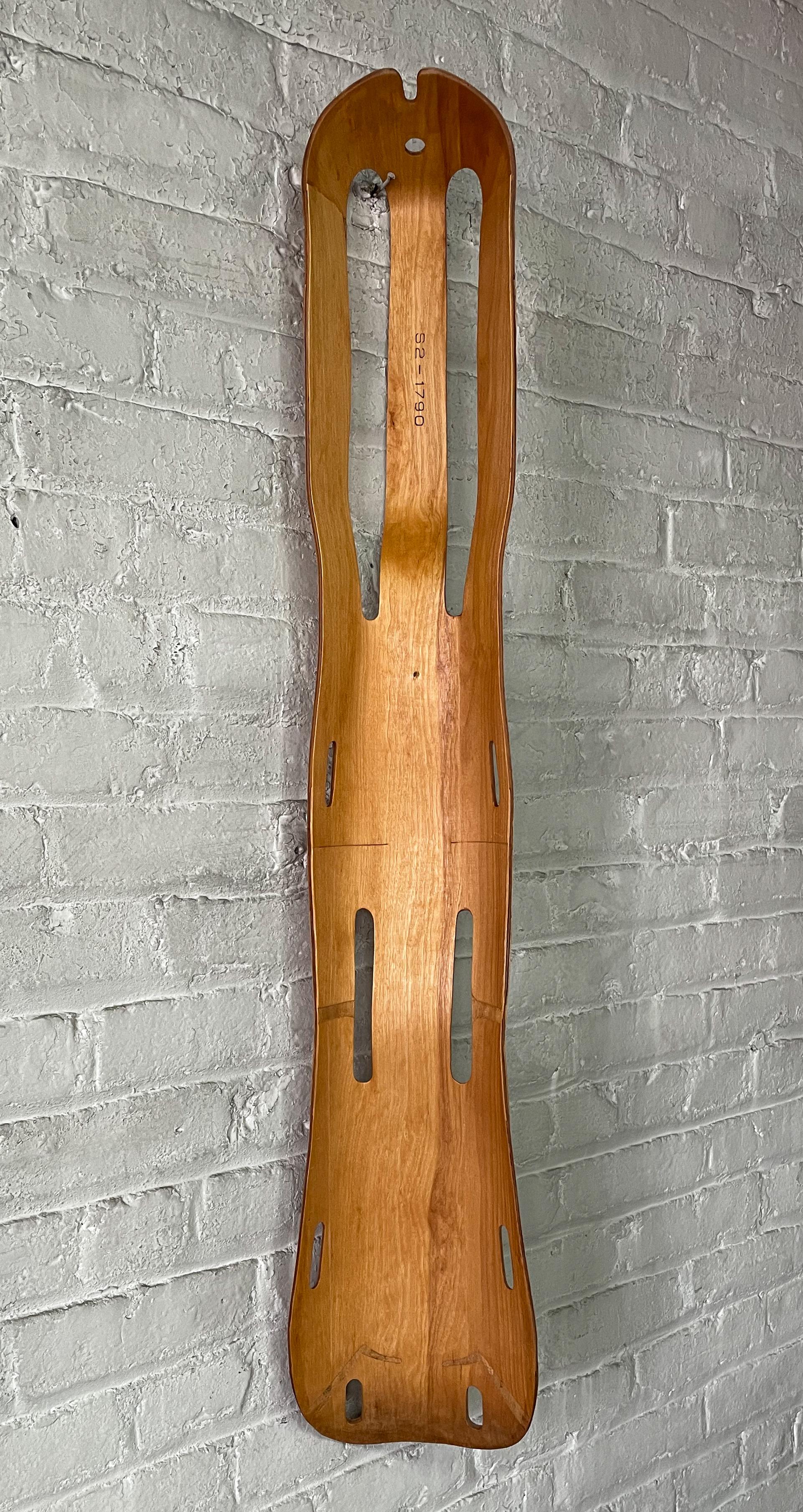 Leg splint of molded mahogany plywood designed by Charles and Ray Eames and produced by Evans Products Company of Venice, California. The Eames's first mass-production success, the leg splint was sold to the U.S. Navy during WWII. It corresponded