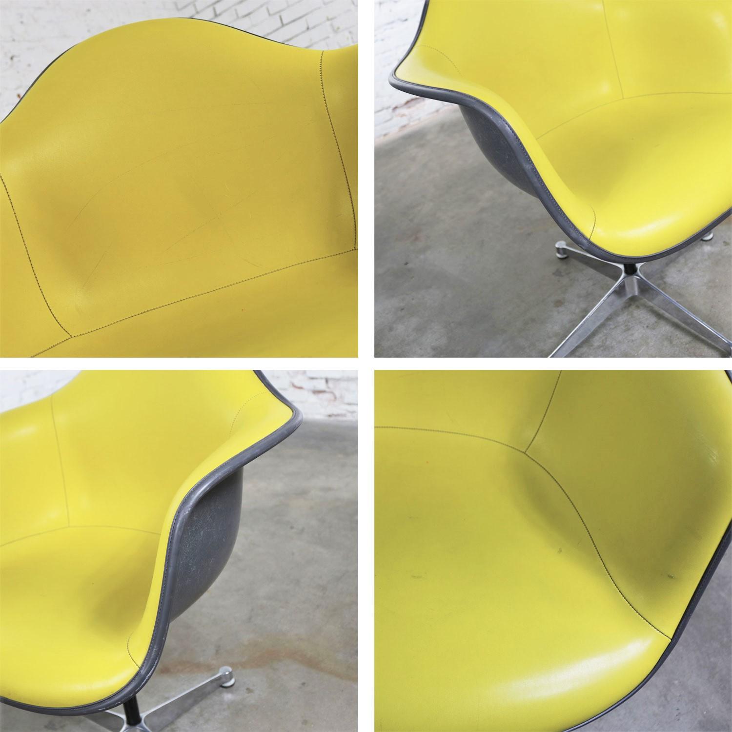 Naugahyde Eames PAC Yellow Padded Swivel Armchair w/Gray Fiberglass Shell & Aluminum Base For Sale