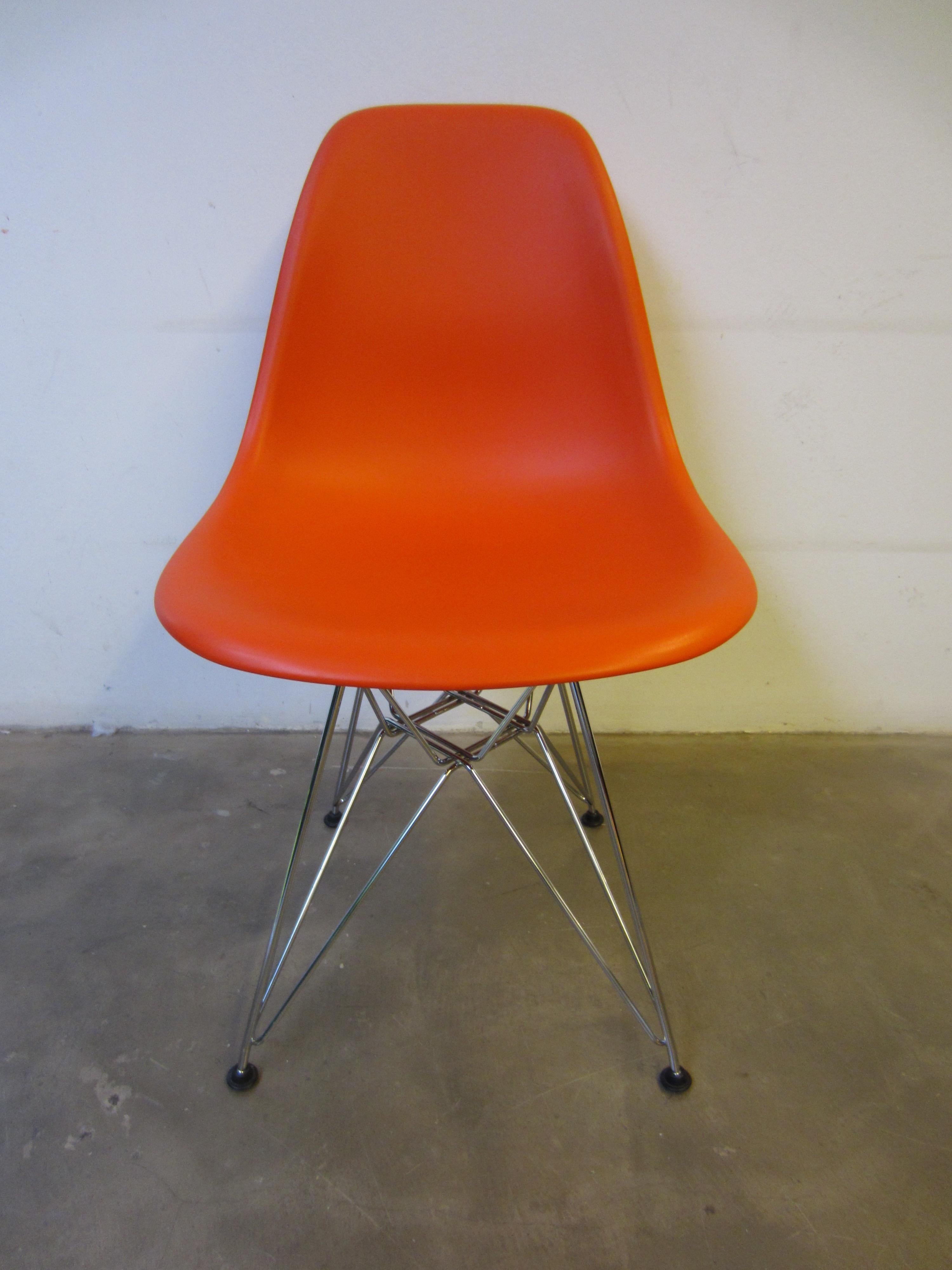 Eames plastic red chair, Charles & Ray Eames, Vitra.