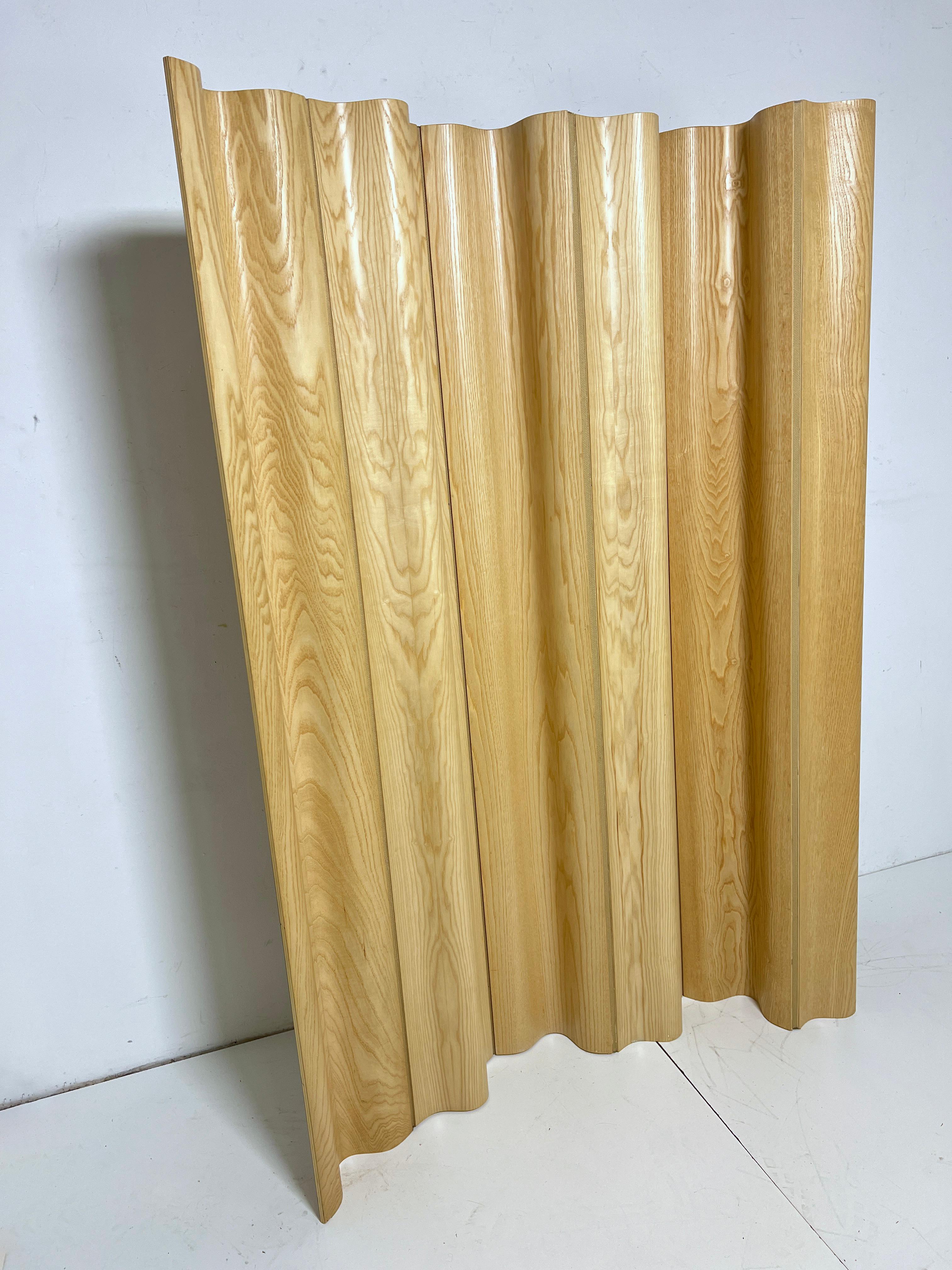 A molded ash plywood folding screen /room divider, the 