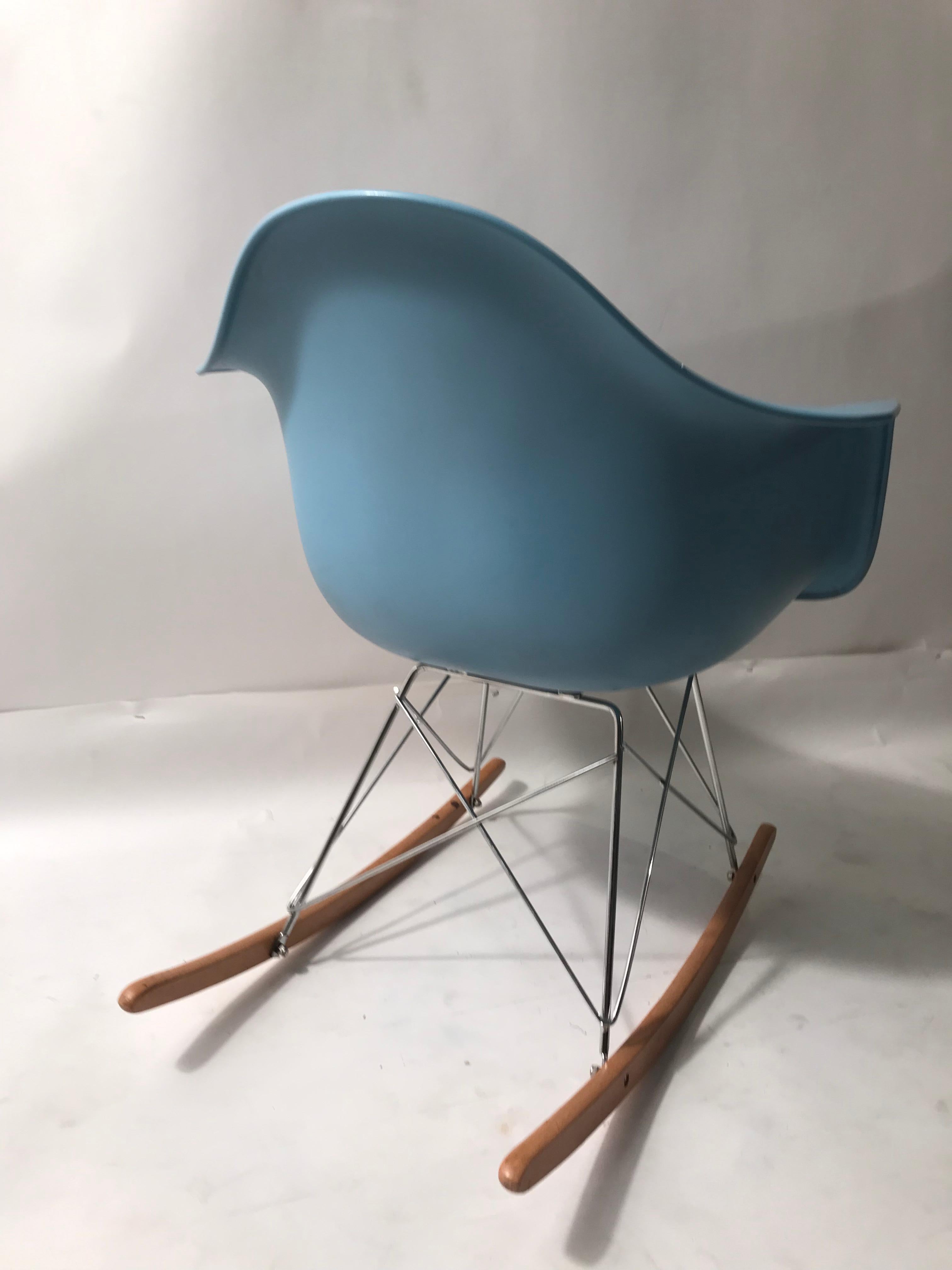 blue eames rocking chair