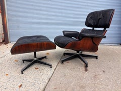 Eames Rosewood Down-Filled 670 Lounge Chair and Ottoman