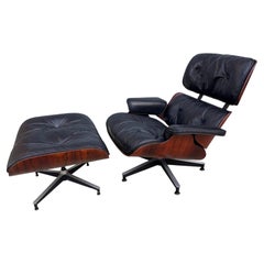 Eames Rosewood Down-Filled 670 Lounge Chair and Ottoman