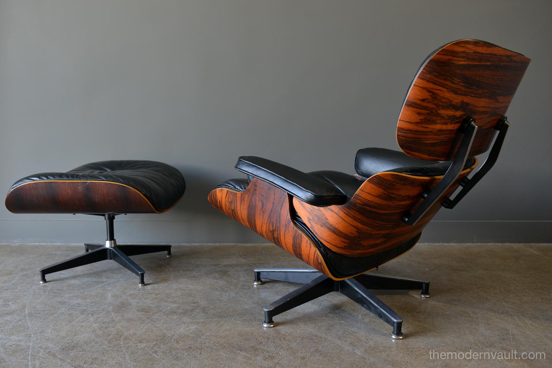 Eames rosewood lounge chair and ottoman, circa 1971. Original 3rd generation (early to mid-1970s) Charles Eames 670 and 671 lounge chair and ottoman for Herman Miller in black leather and rosewood. Beautiful soft patina to the leather, original 5