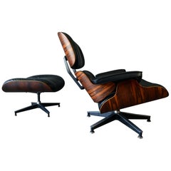 Eames Rosewood Lounge Chair and Ottoman, circa 1971