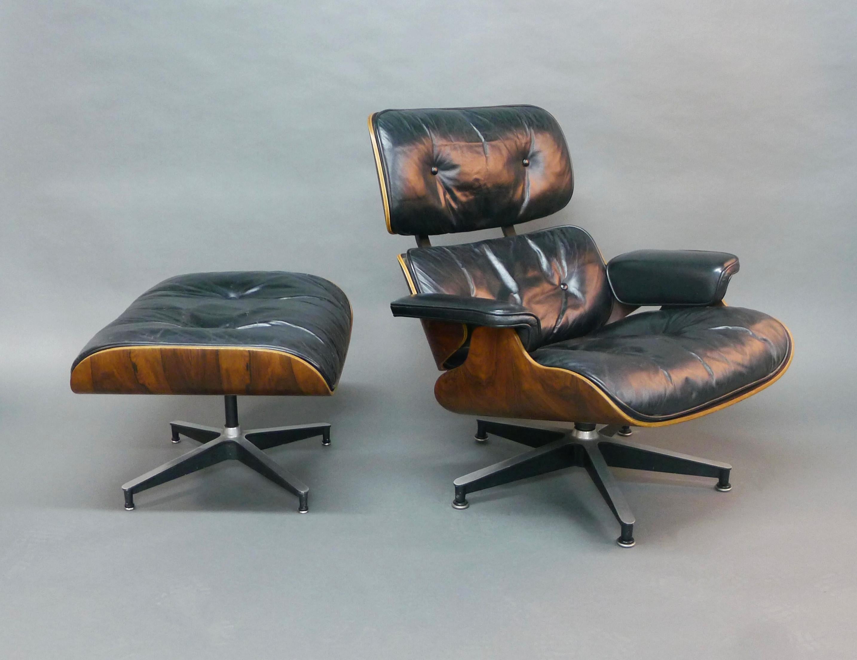 Charles and Ray Eames Lounge Chair and Ottoman, model 670/671 for Herman Miller, USA

Rosewood veneer shell with feather filled buttoned black leather upholstery. Circular steel Herman Miller label to underside of chair.

In good original condition,