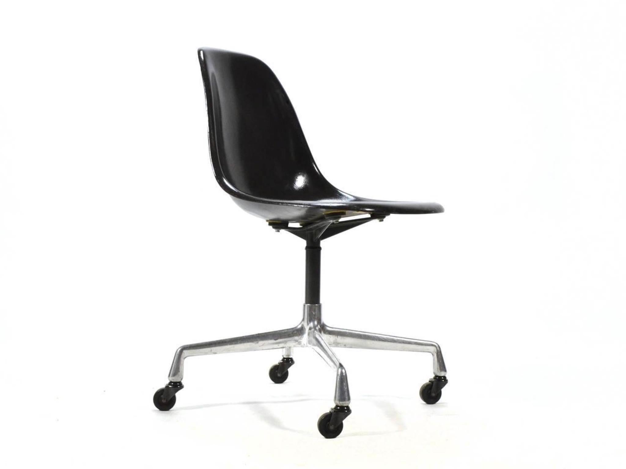 Six classic and pristine fiberglass, armless Eames shell chairs, also referred to as the PSCC, designed for Herman Miller, circa 1950s. The chair is supported on a metal column and cross legs on casters. Measures: 18