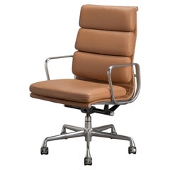 Eames Soft Pad Executive Chairs in Butterscotch Leather by Herman Miller