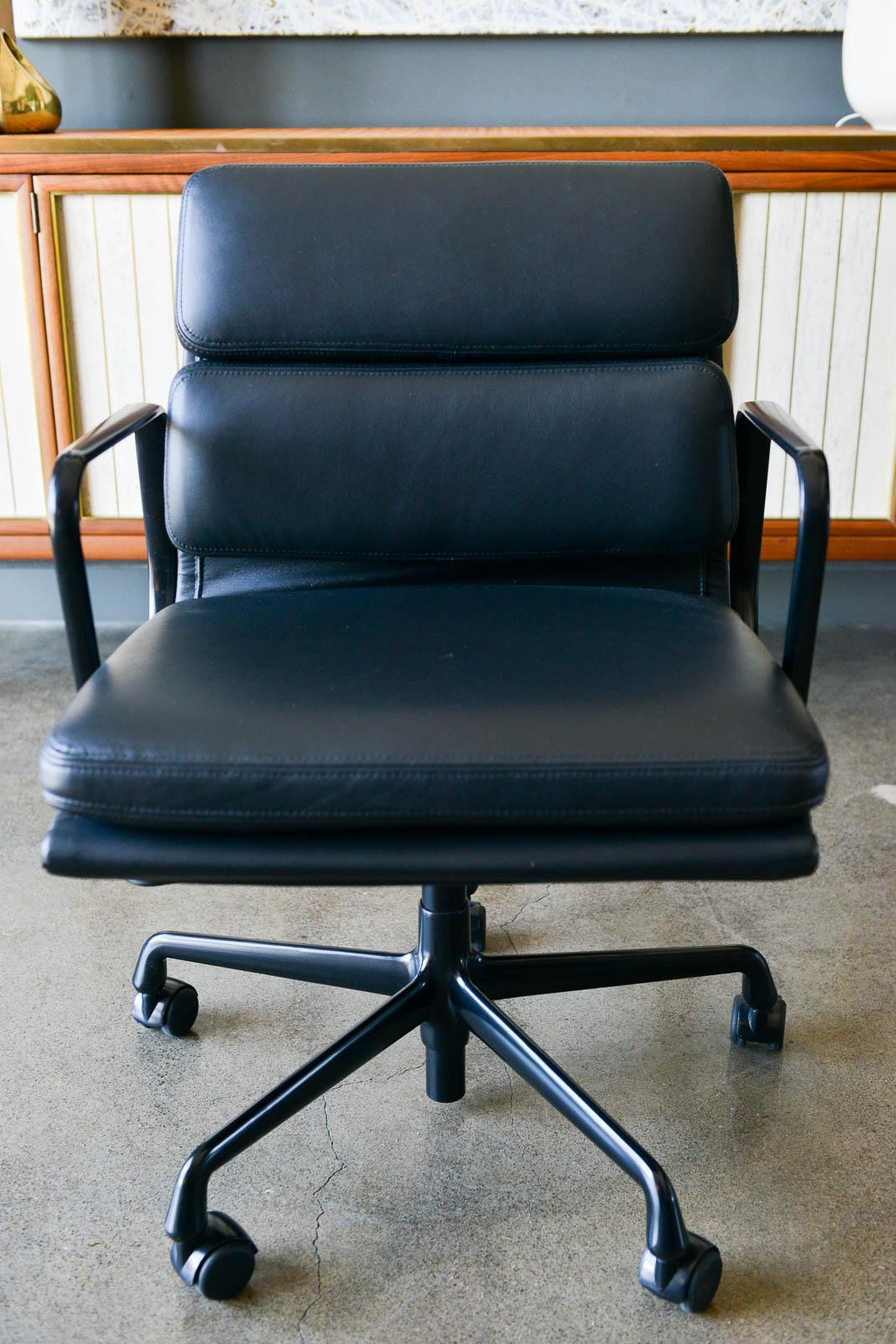 Eames soft pad management chair in black leather. New production, never been used. We have two available with hydraulic controls. Soft black leather with black base and casters.

Measure: 33.75