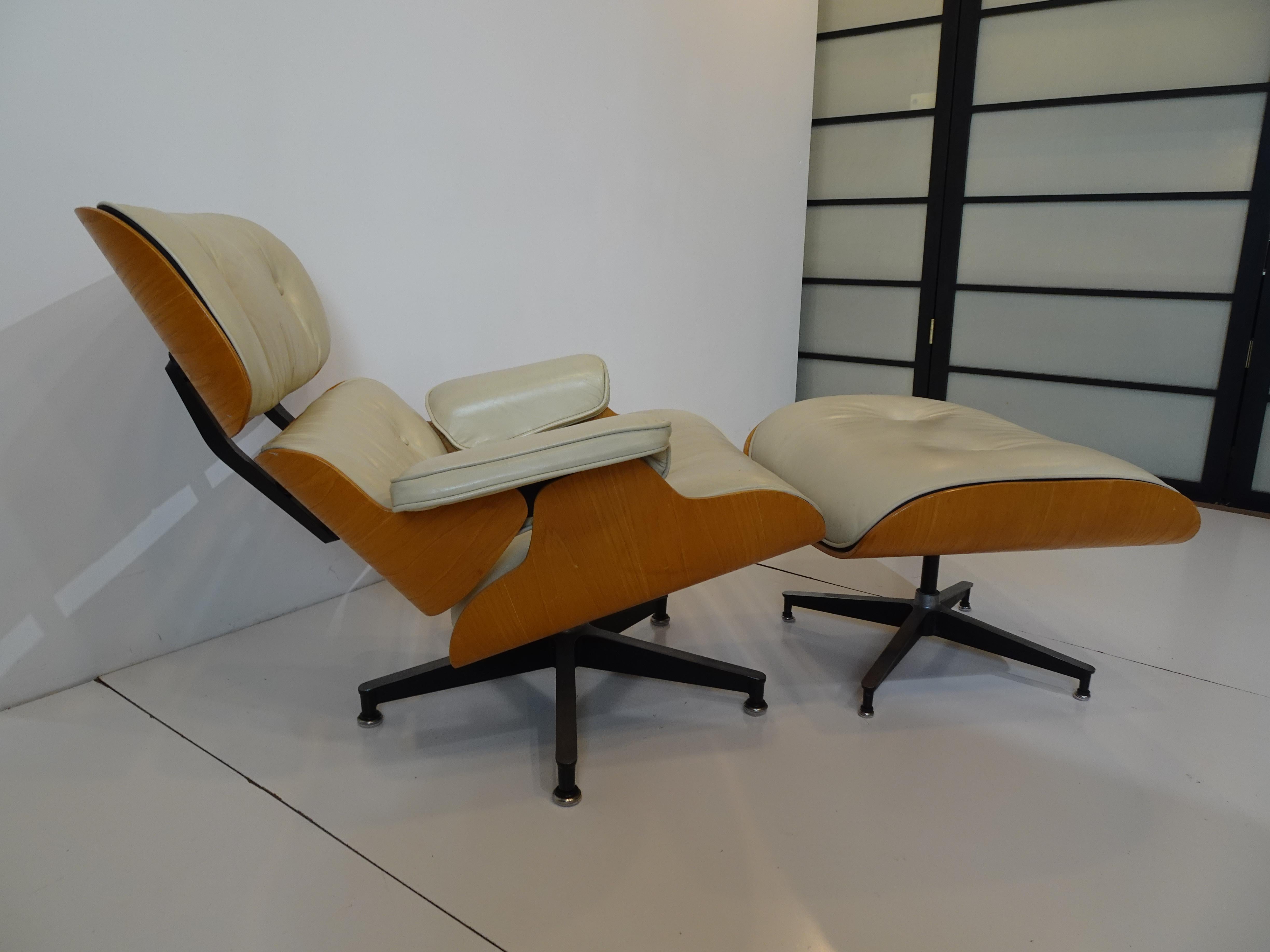 A very nice iconic Eames 670 lounge chair with 671 ottoman special ordered by the original former owner in a soft buttery ivory leather with American oak shell . A rare combination giving the chair a light look and feel very different then the dark