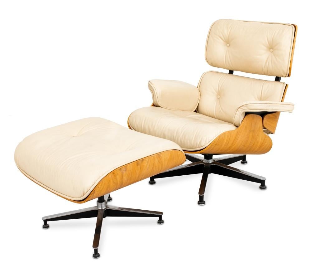 Eames Style Bentwood Lounge Chair and Ottoman, covered in beige leather and on aluminum swivel bases on casters. Dimensions: Chair: 33