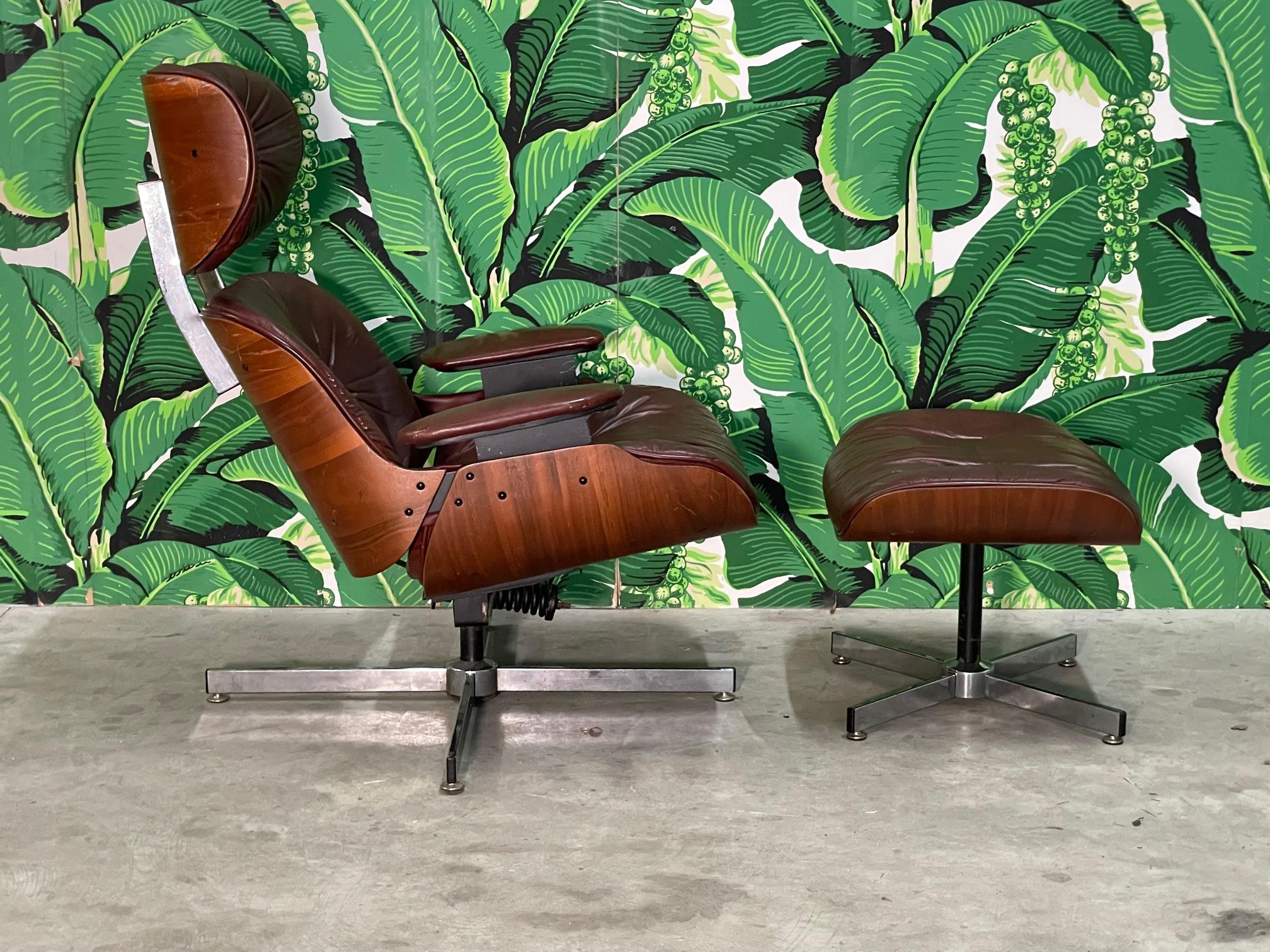 Mid-Century Modern Eames Style Leather Lounge Chair and Ottoman in Oxblood