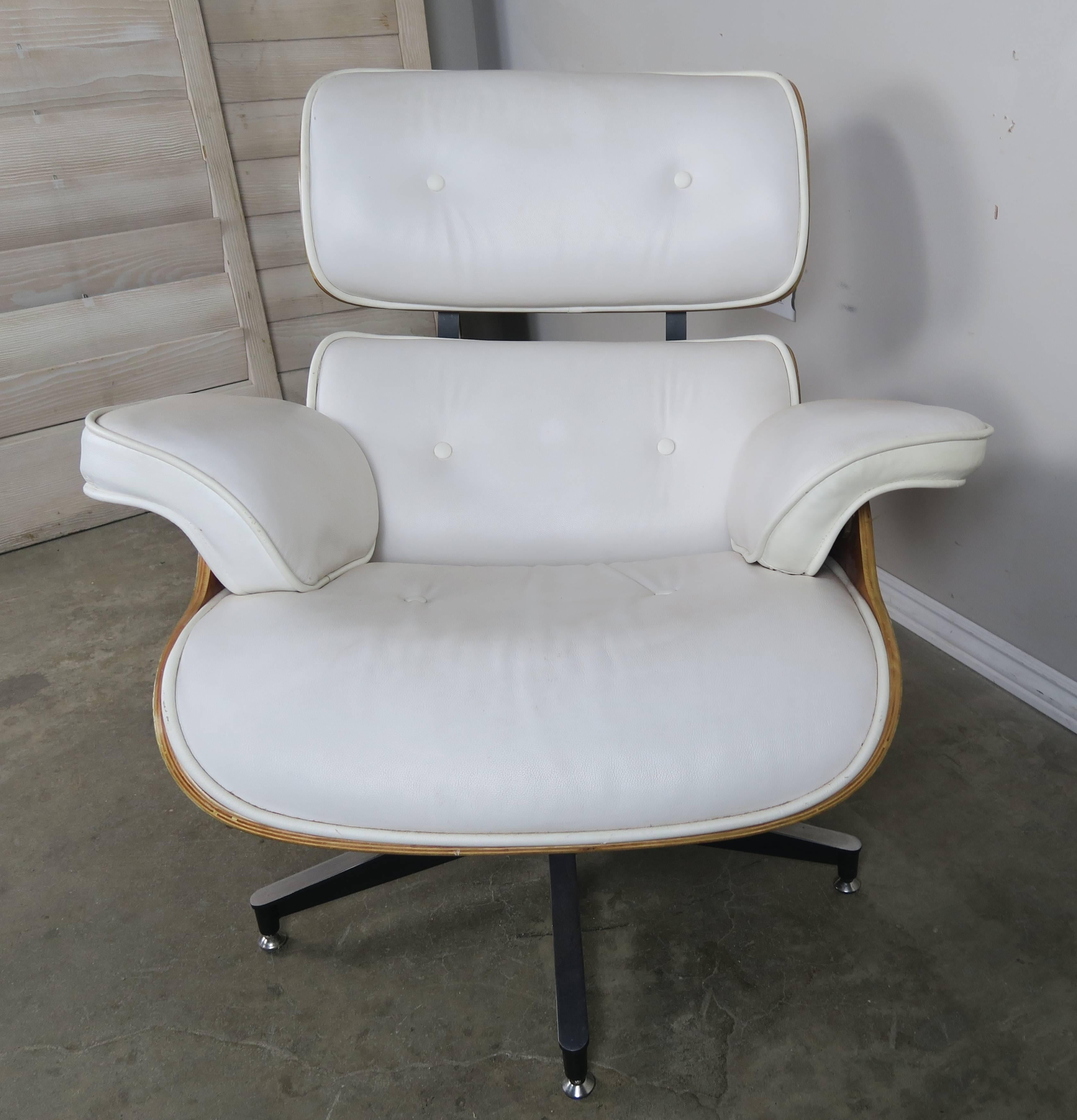 white leather eames lounge chair