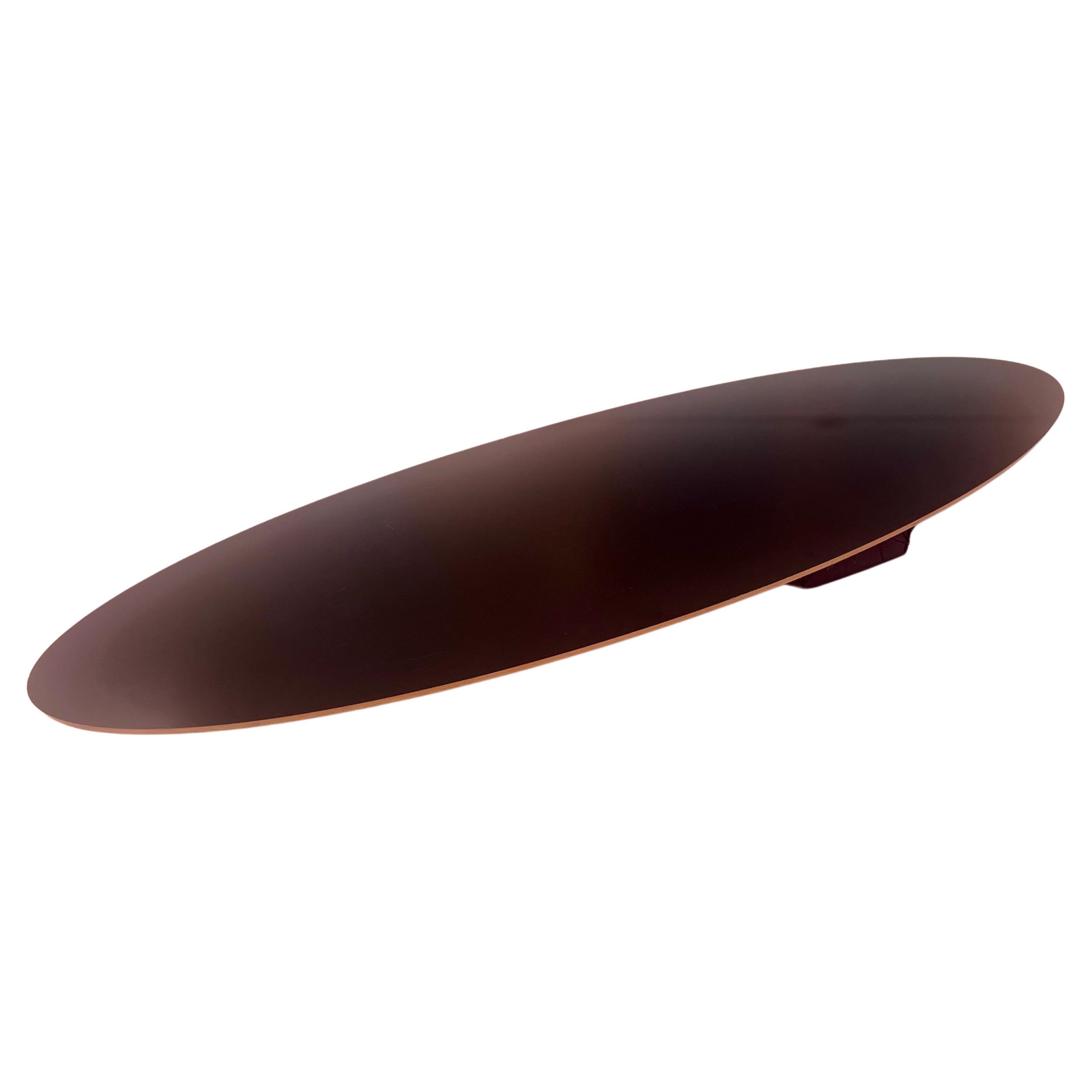 1990;s Original long surfboard oval coffee table designed by Eames, for Herman Miller nice condition a must have piece for any Mid Century, Danish Modern home decor nice condition a couple of fleabites on the edge as shown.