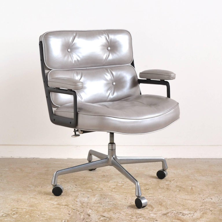This Classic time-life chair by Charles and Ray Eames has been given a playful makeover with metalic silver leather upholstery. Originally conceived as an easy chair for the reception area of the time-life building, the design soon became a