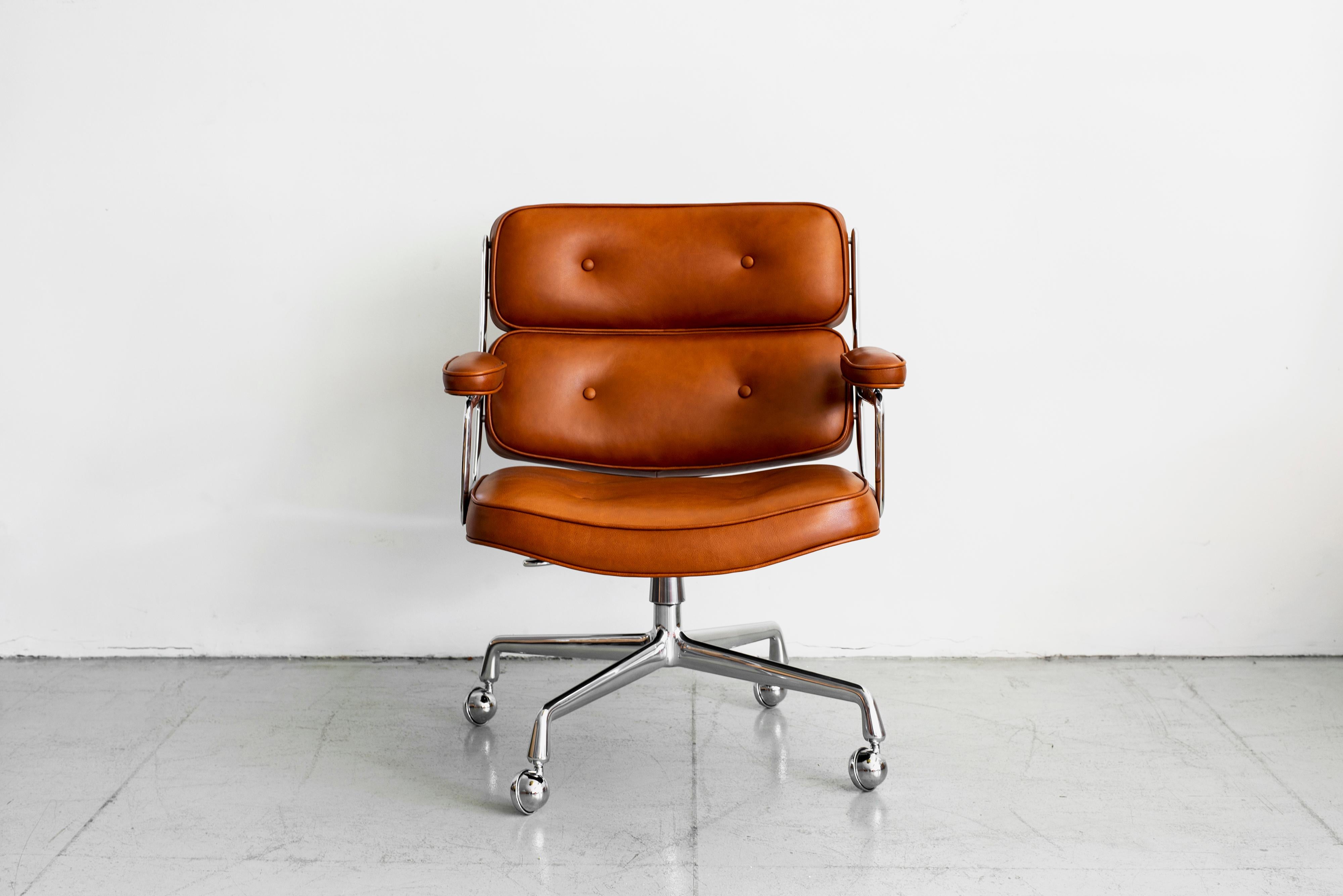 Classic office chair from the Time Life building in New York. New caramel brown leather upholstery with newly polished aluminum base. Chair has an adjustable height with tilt and swivel. Truly an iconic piece.