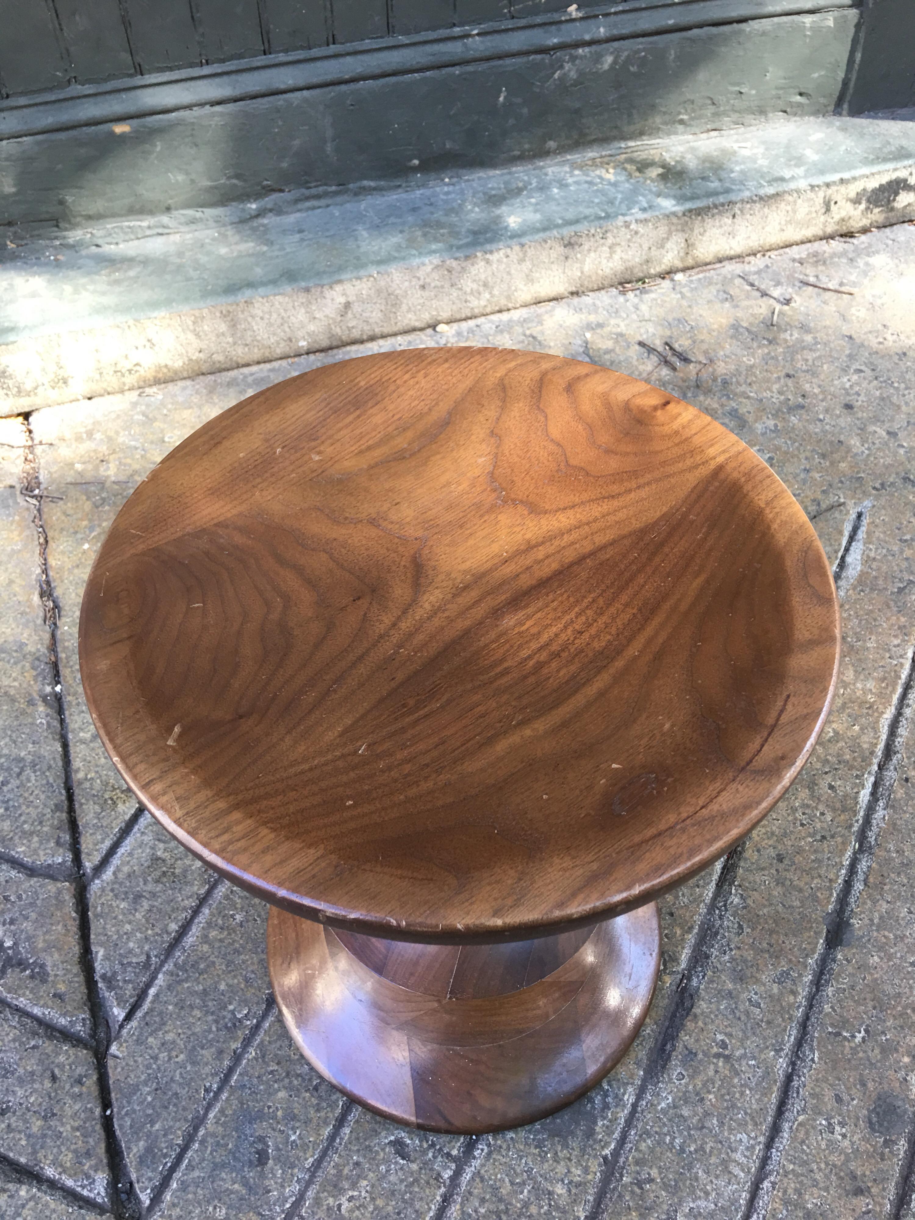 Eames time life Herman Miller walnut stool in shape C. Designed in 1959 for the Time Life Corporation, We sold this stool originally as Herman Miller dealers for 20 years and was one of our first sales. We have bought it back form the original