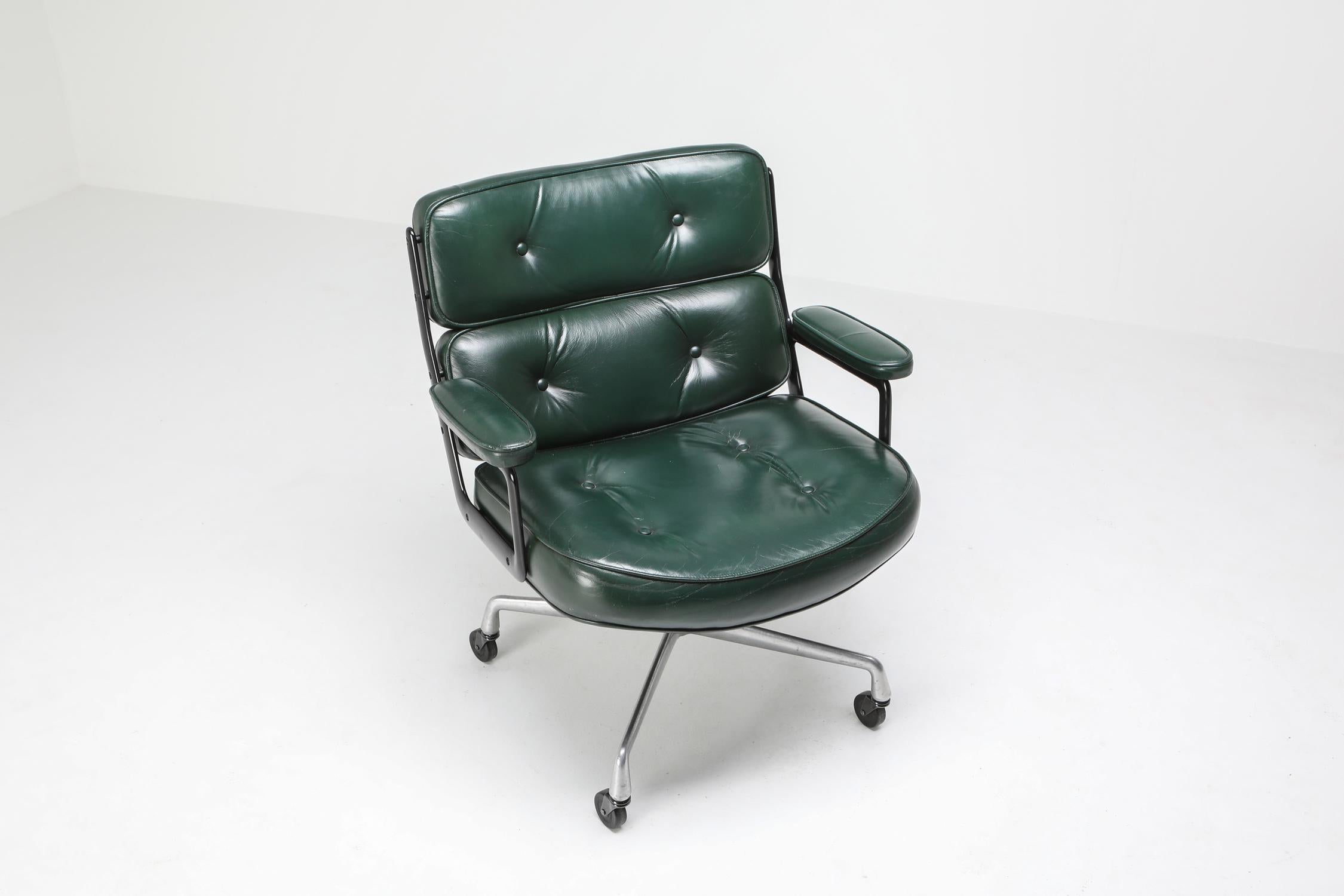 Mid-Century Modern desk chair by Charles and Ray Eames in green leather

a true mad men style gem.
