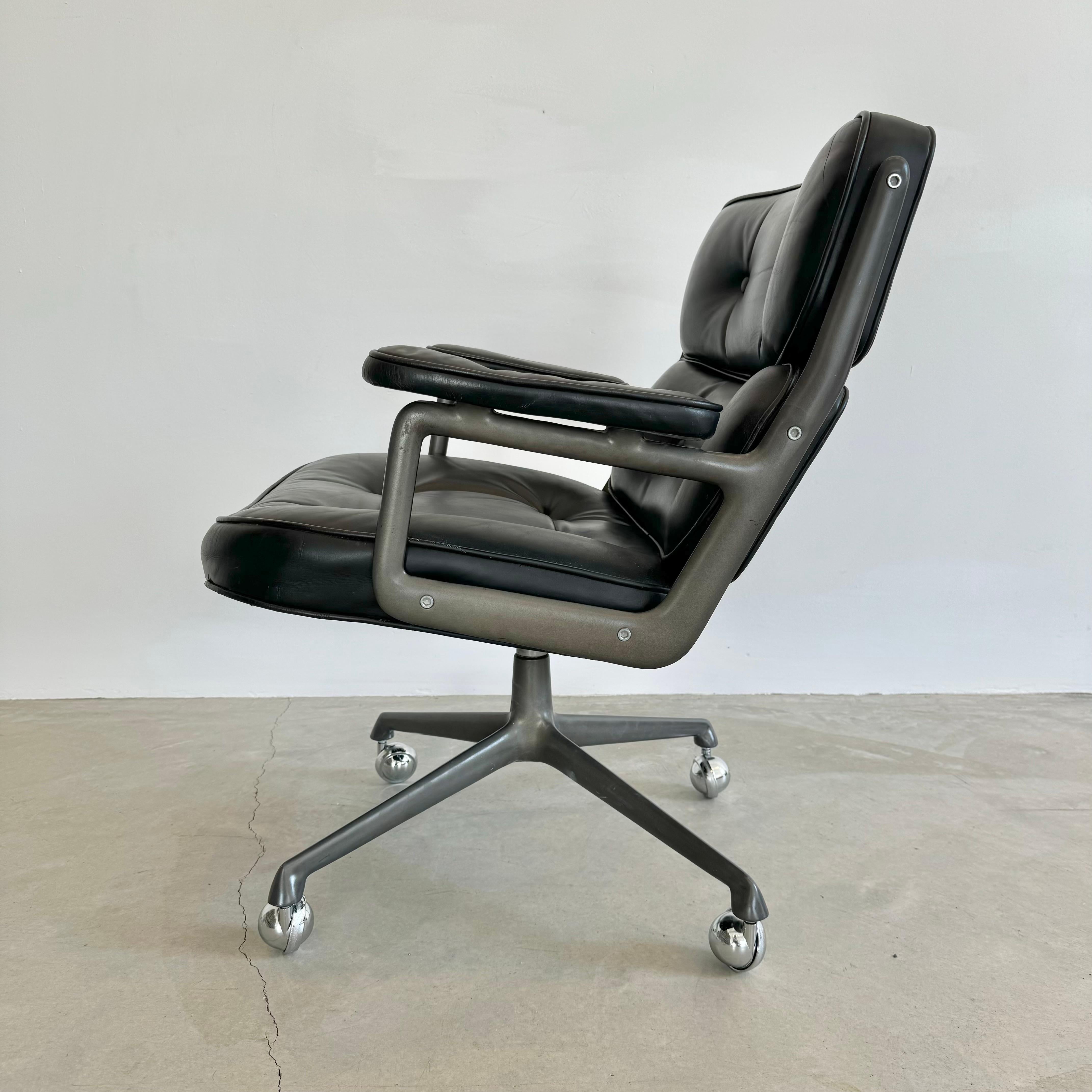 Classic Eames Time Life Lobby Chair in black leather for Herman Miller. Black leather is in good condition with wear as shown. Extremely comfortable and worn in. Chair swivels. Height is adjustable. Fantastic patina to metal and leather. The perfect